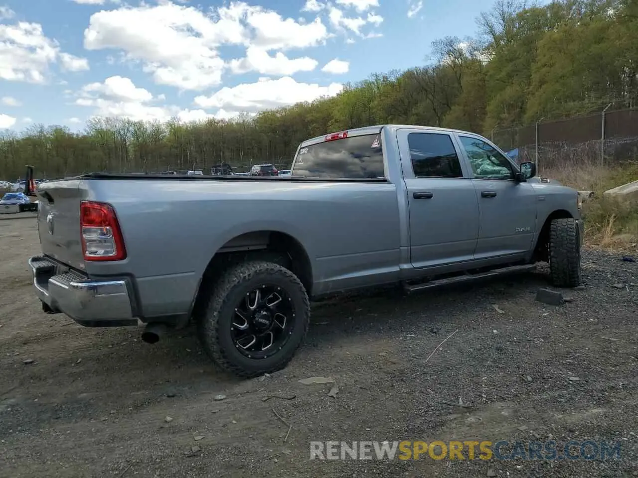 3 Photograph of a damaged car 3C6UR4HJ8NG340275 RAM 2500 2022
