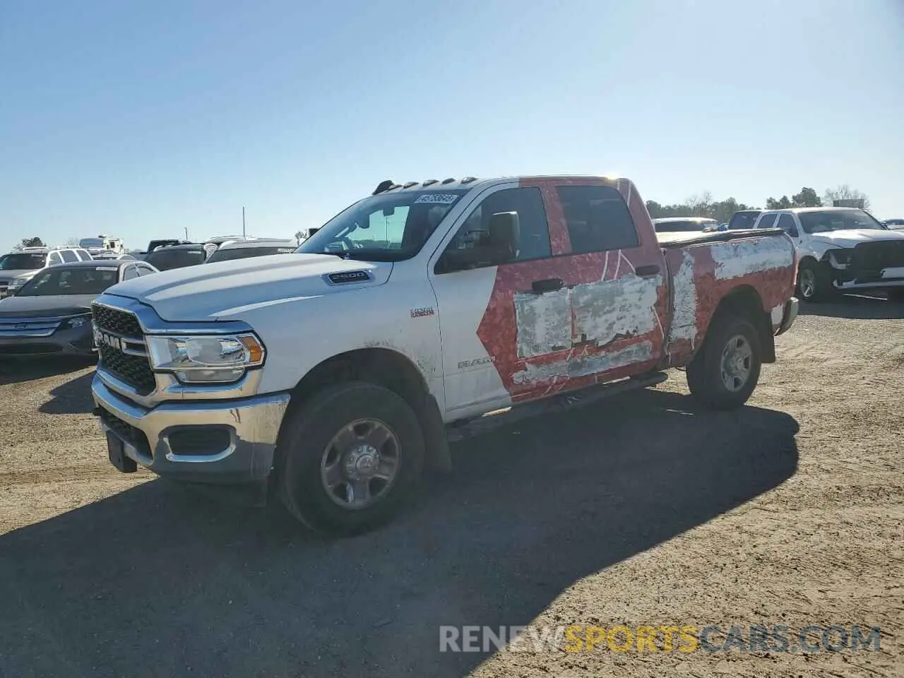 1 Photograph of a damaged car 3C6UR5CJ1NG129156 RAM 2500 2022