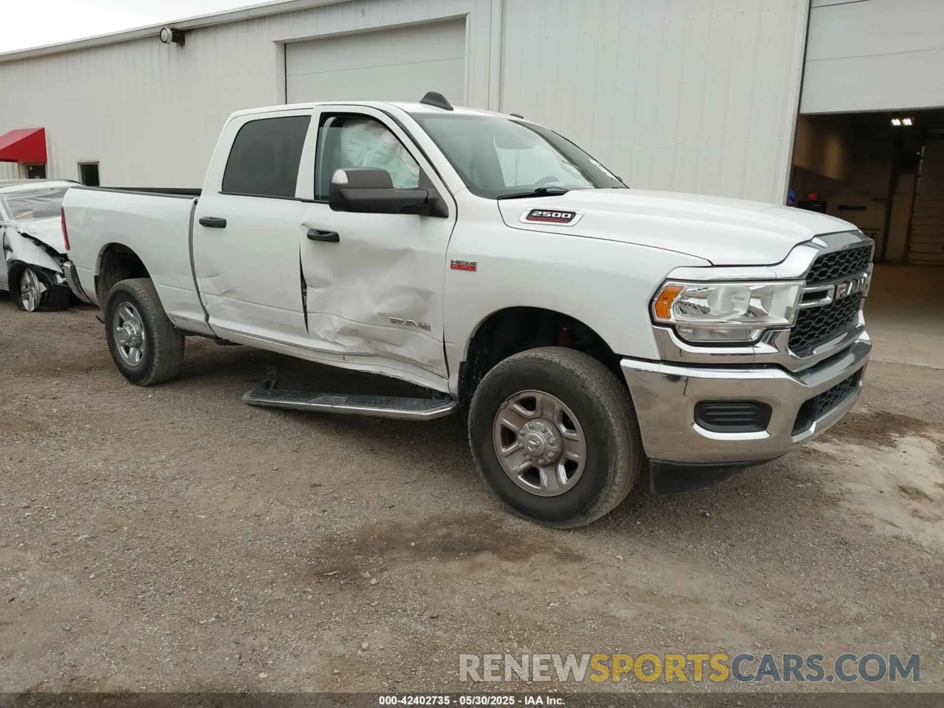 1 Photograph of a damaged car 3C6UR5CJ2NG150131 RAM 2500 2022