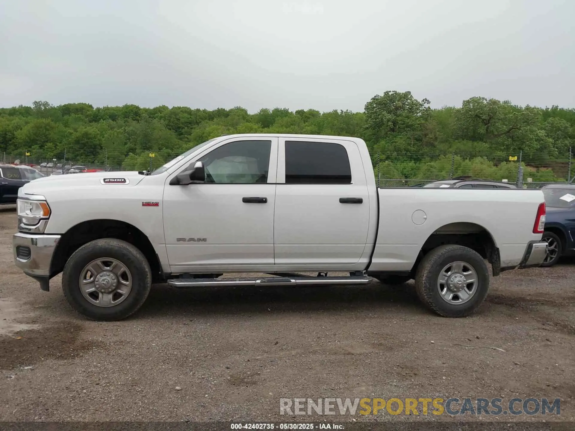 14 Photograph of a damaged car 3C6UR5CJ2NG150131 RAM 2500 2022