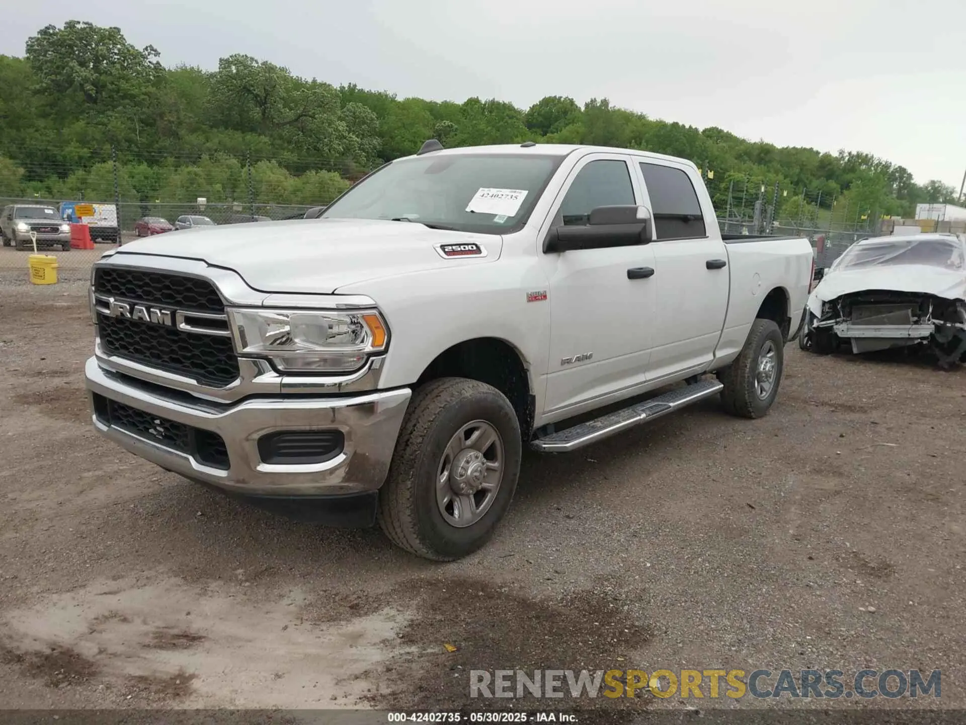 2 Photograph of a damaged car 3C6UR5CJ2NG150131 RAM 2500 2022