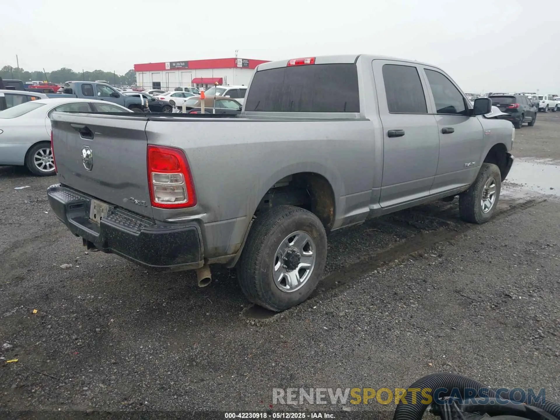 4 Photograph of a damaged car 3C6UR5CJ2NG253565 RAM 2500 2022