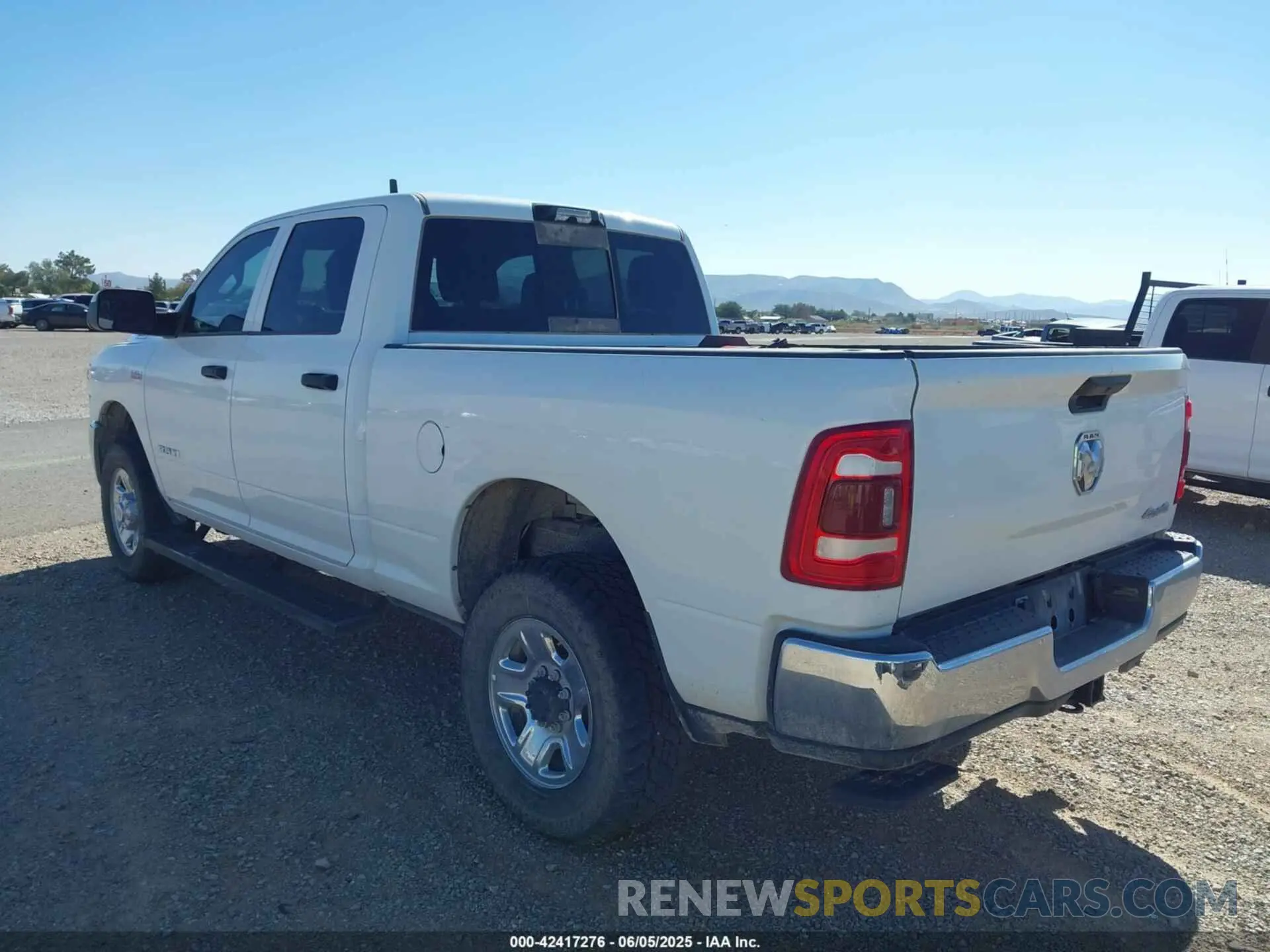 3 Photograph of a damaged car 3C6UR5CJ2NG272004 RAM 2500 2022