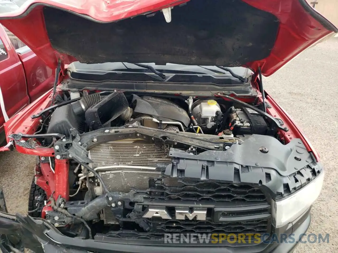 11 Photograph of a damaged car 3C6UR5CJ2NG305552 RAM 2500 2022