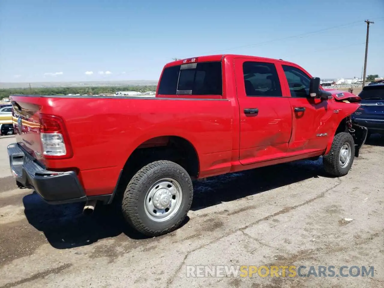 3 Photograph of a damaged car 3C6UR5CJ2NG305552 RAM 2500 2022