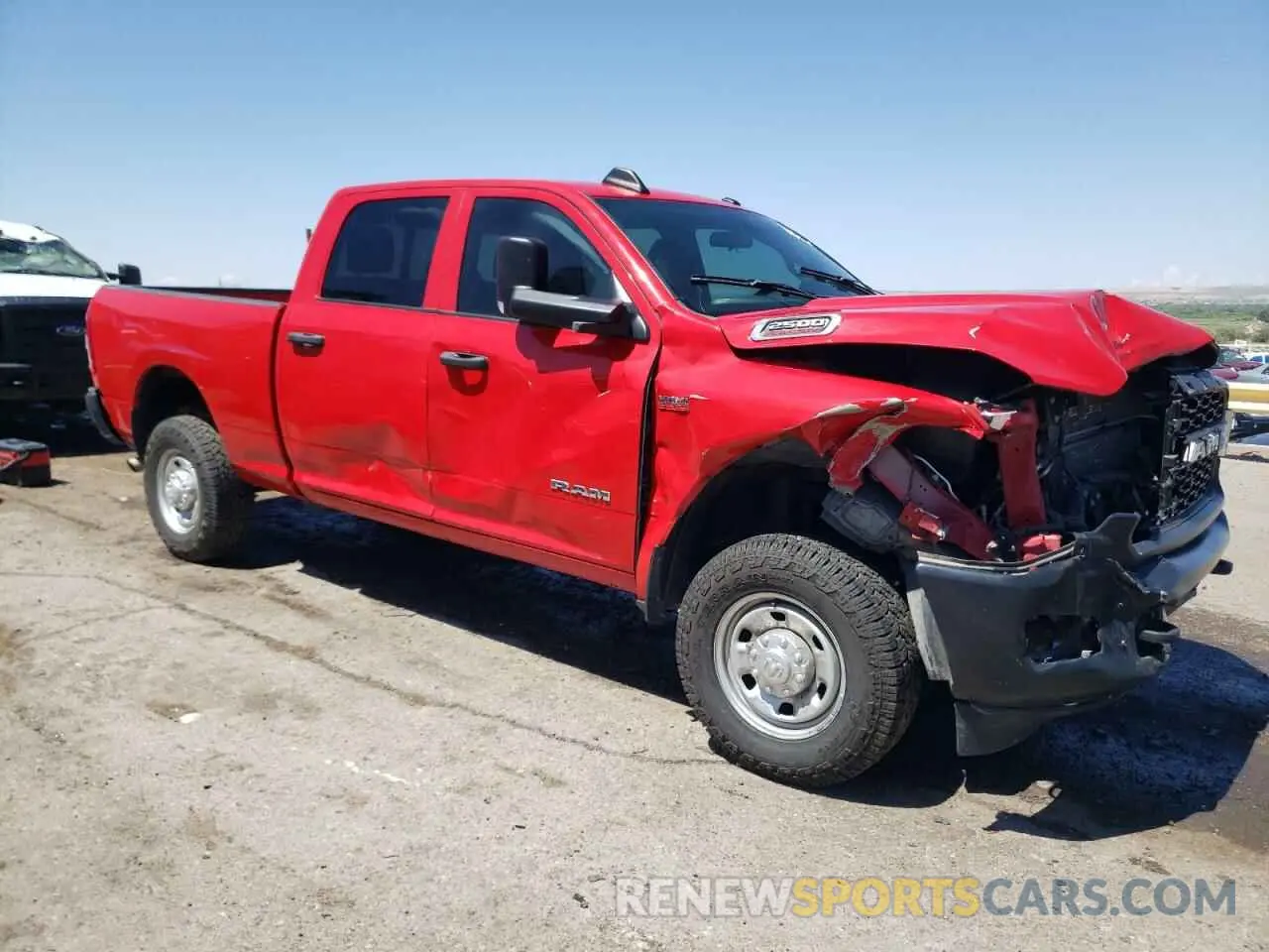 4 Photograph of a damaged car 3C6UR5CJ2NG305552 RAM 2500 2022