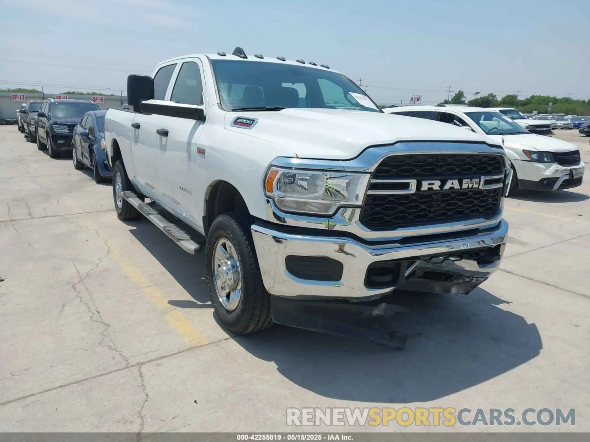 1 Photograph of a damaged car 3C6UR5CJ2NG372068 RAM 2500 2022