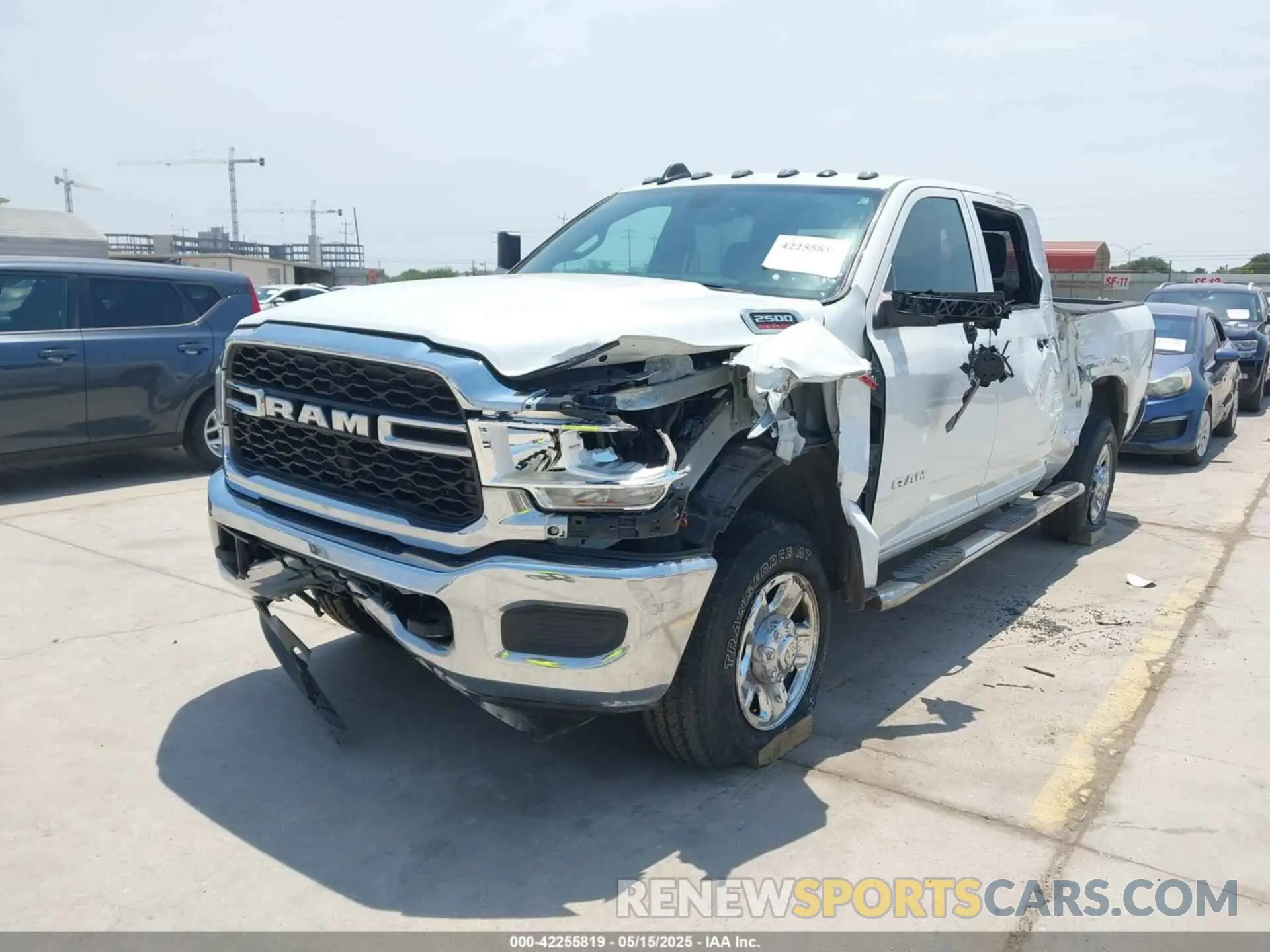 2 Photograph of a damaged car 3C6UR5CJ2NG372068 RAM 2500 2022
