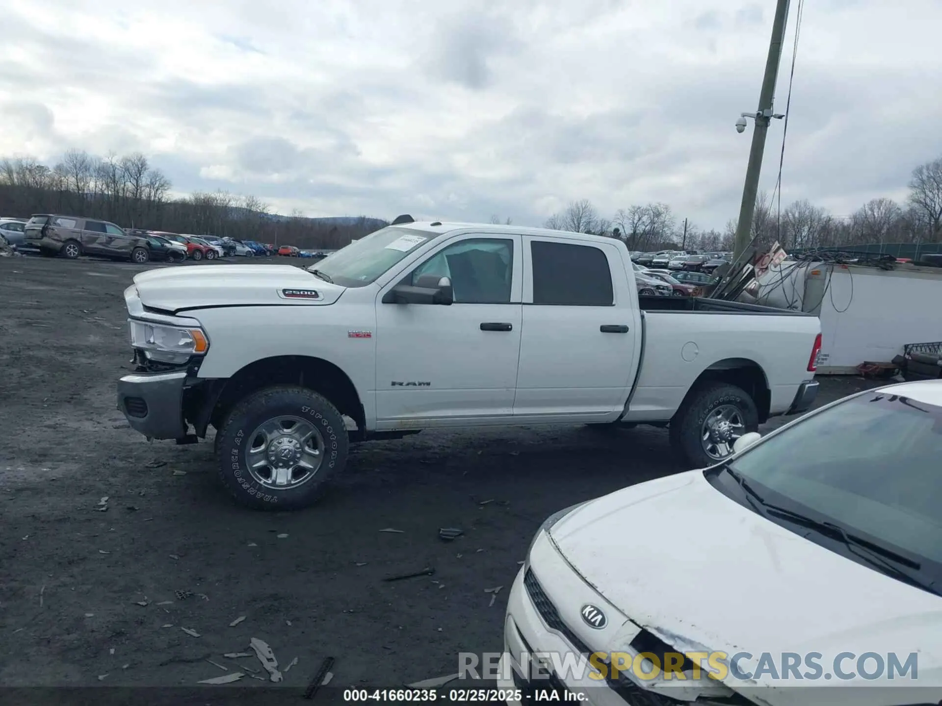 14 Photograph of a damaged car 3C6UR5CJ2NG441695 RAM 2500 2022