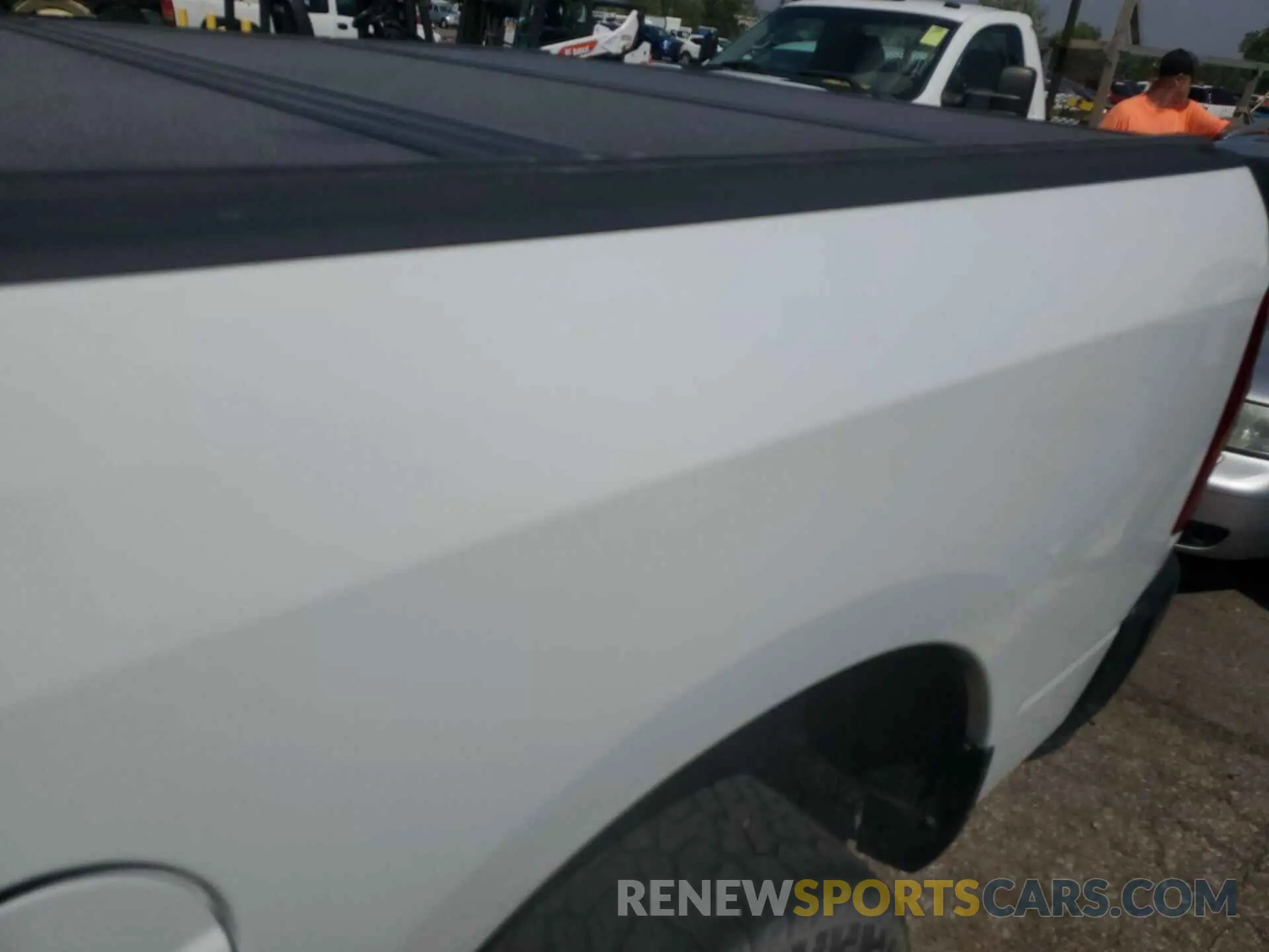 1 Photograph of a damaged car 3C6UR5CJ3NG322473 RAM 2500 2022