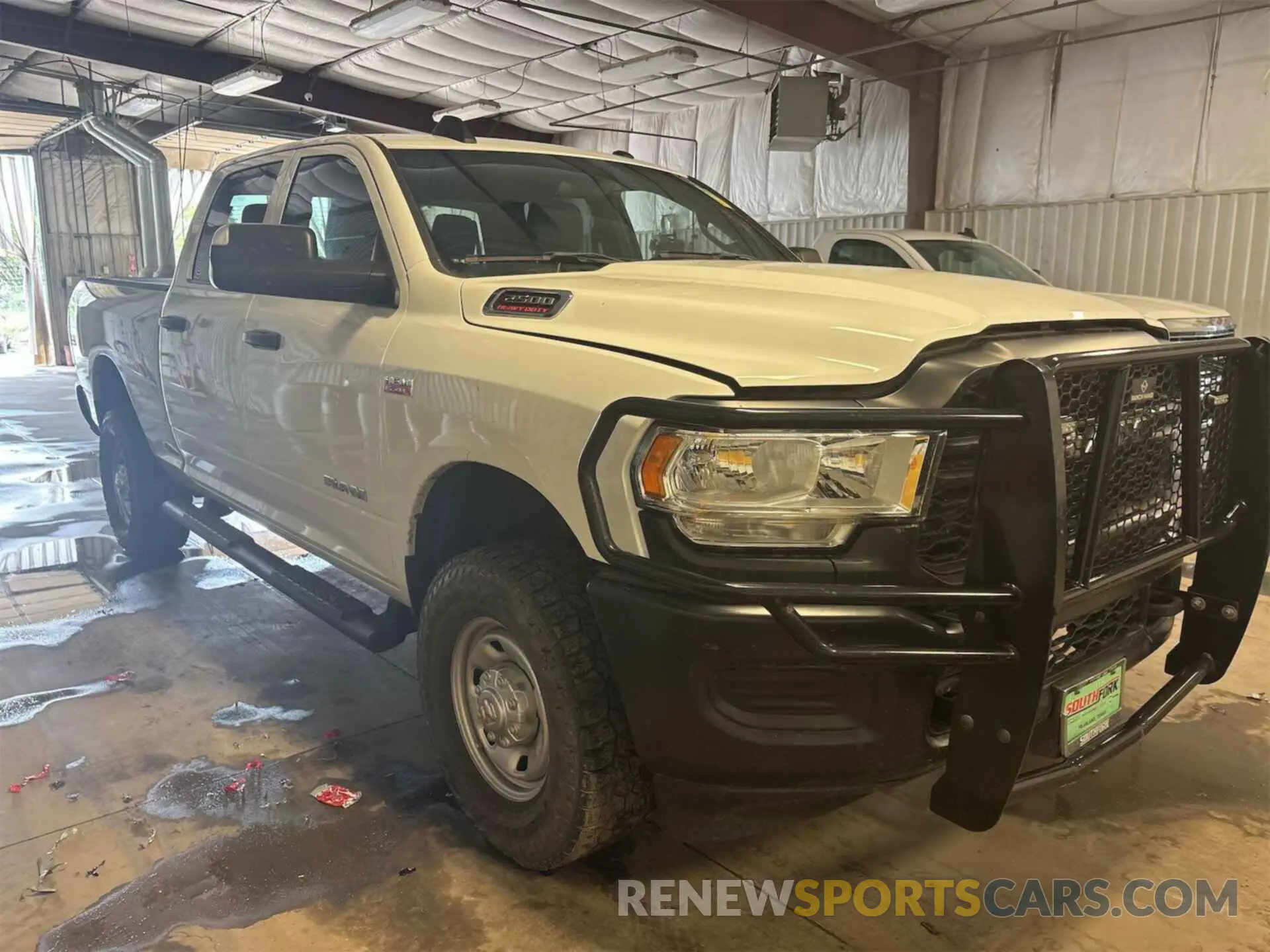 11 Photograph of a damaged car 3C6UR5CJ3NG322473 RAM 2500 2022