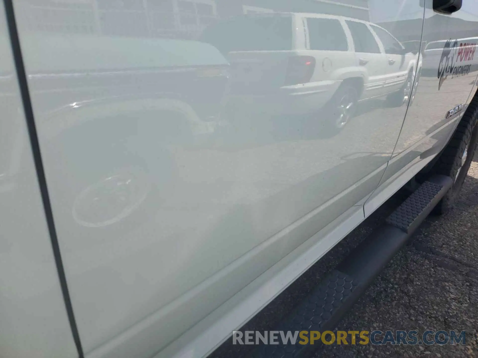 14 Photograph of a damaged car 3C6UR5CJ3NG322473 RAM 2500 2022