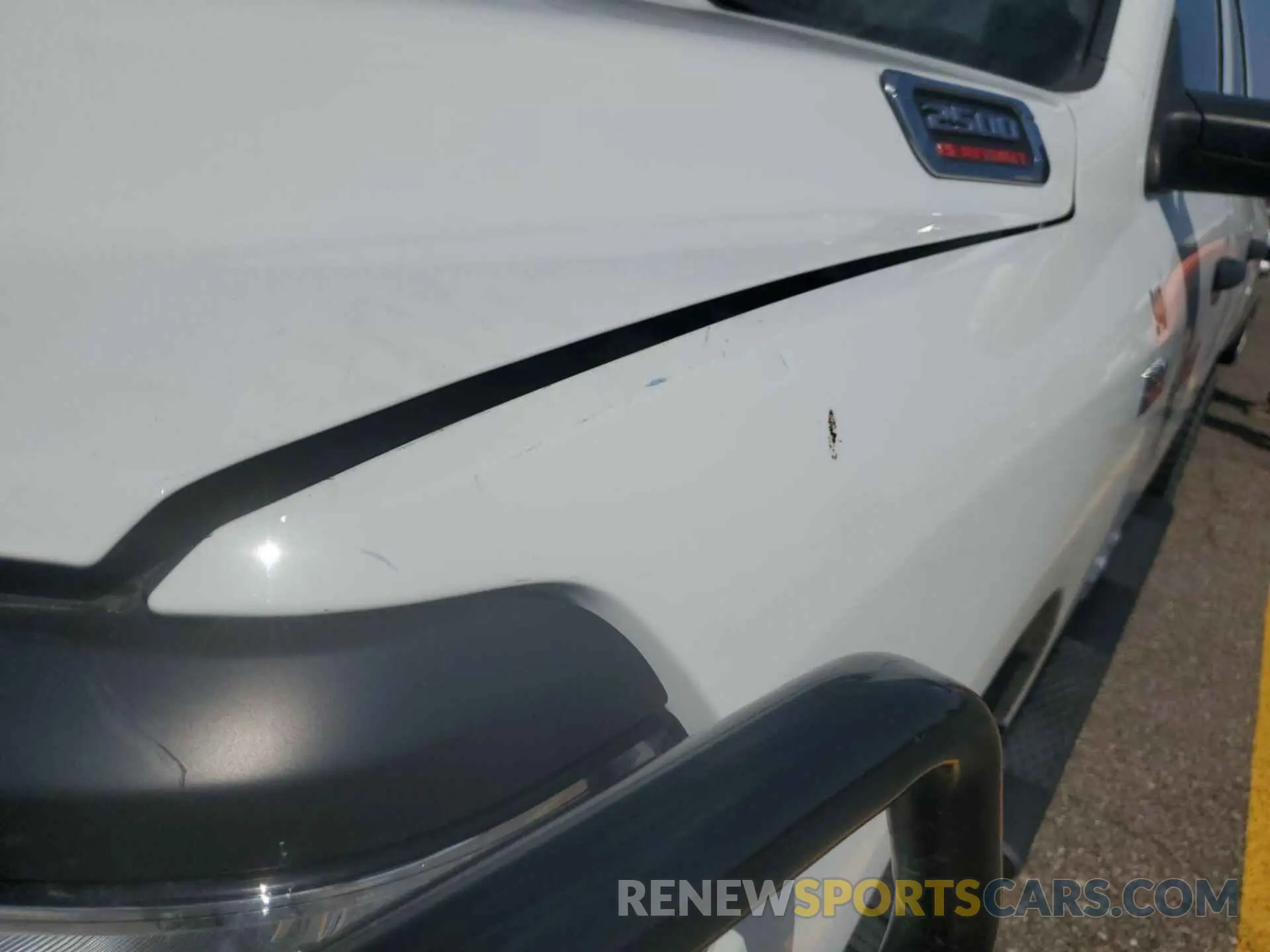 19 Photograph of a damaged car 3C6UR5CJ3NG322473 RAM 2500 2022