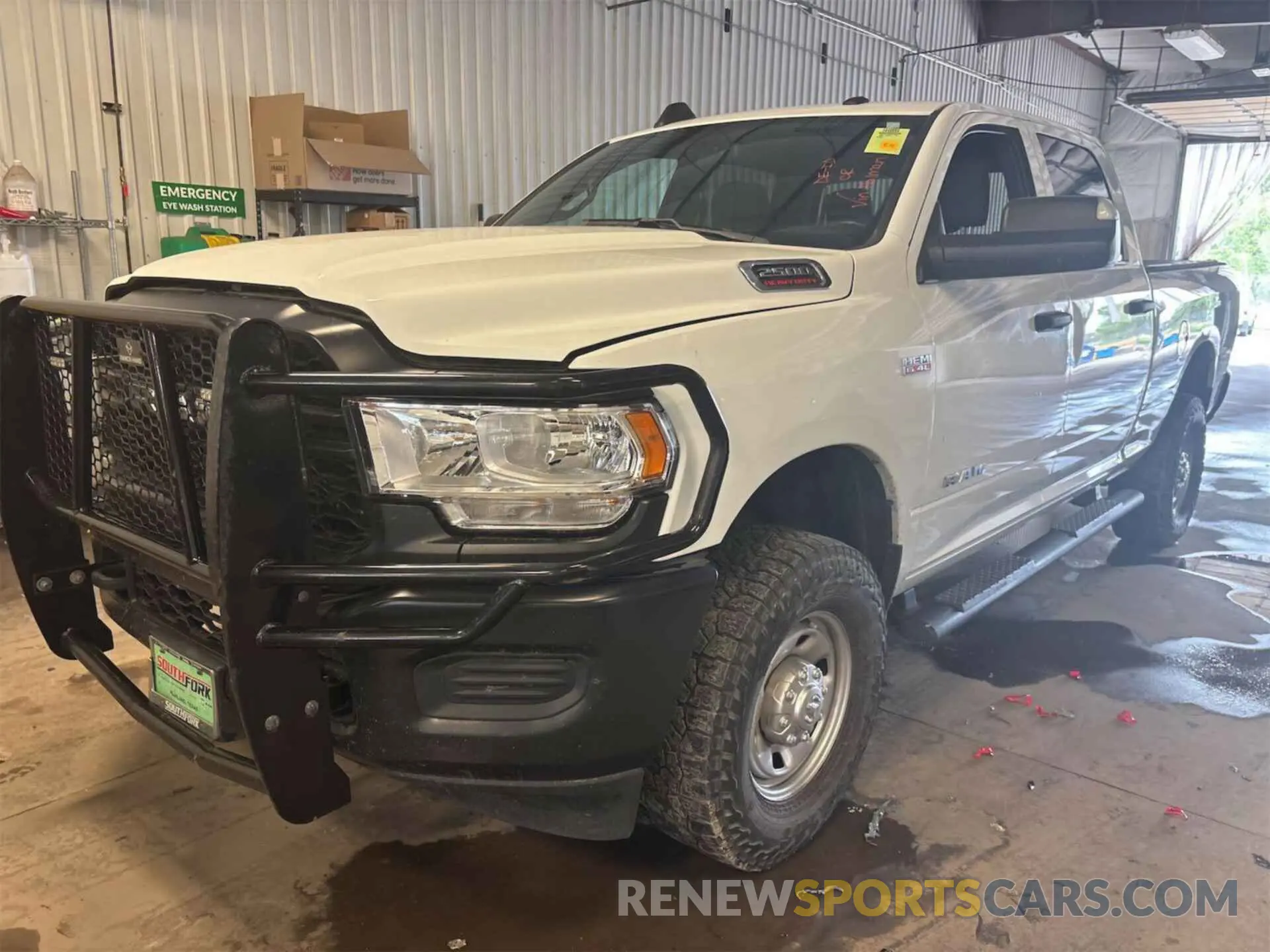 7 Photograph of a damaged car 3C6UR5CJ3NG322473 RAM 2500 2022