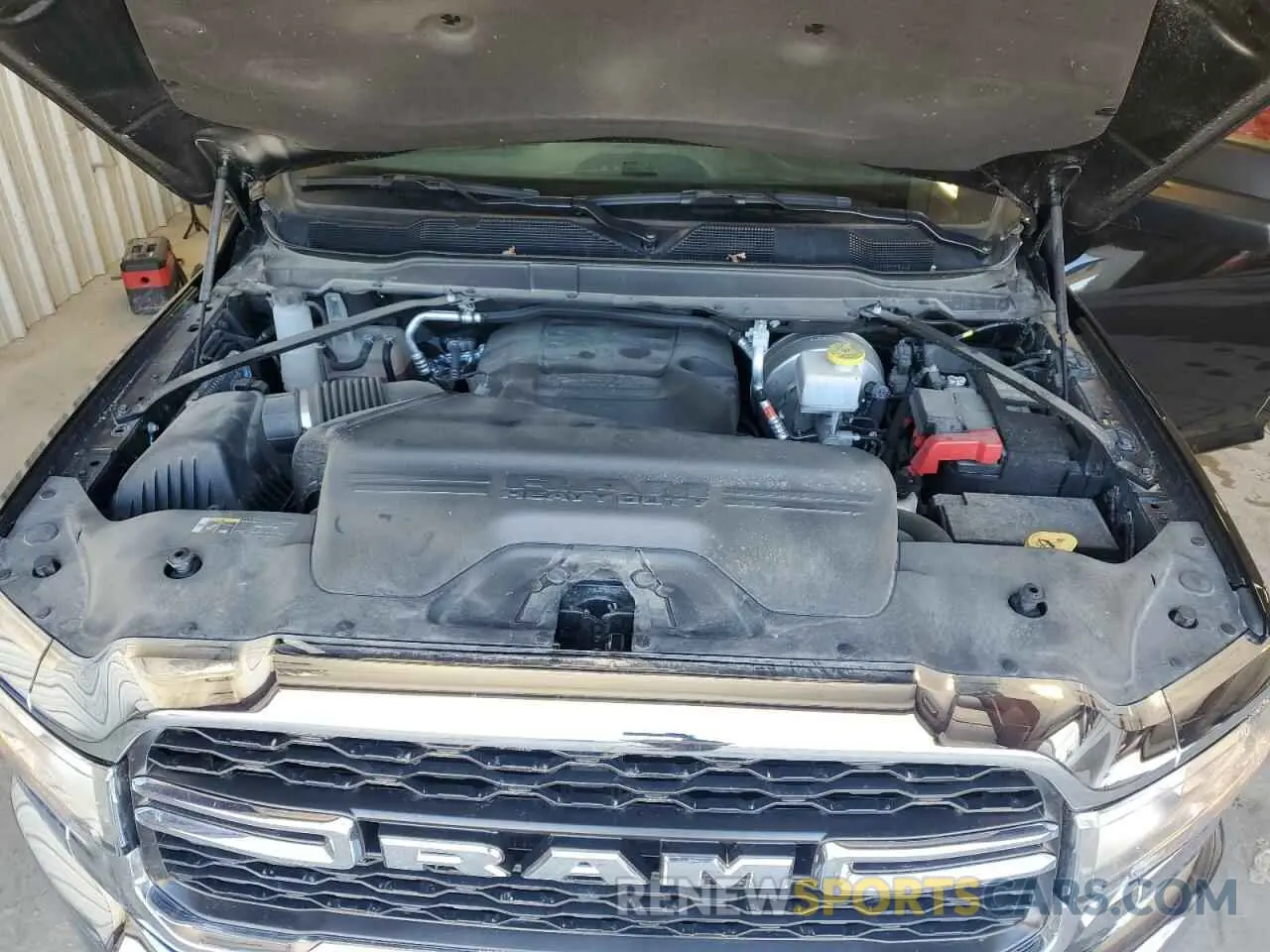 11 Photograph of a damaged car 3C6UR5CJ3NG393494 RAM 2500 2022