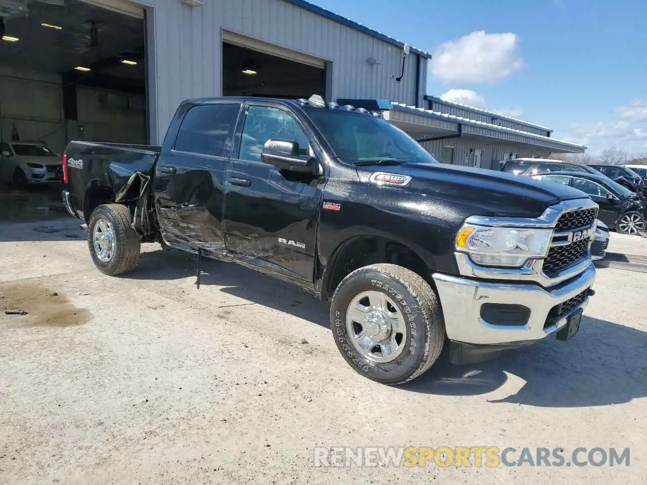4 Photograph of a damaged car 3C6UR5CJ3NG393494 RAM 2500 2022