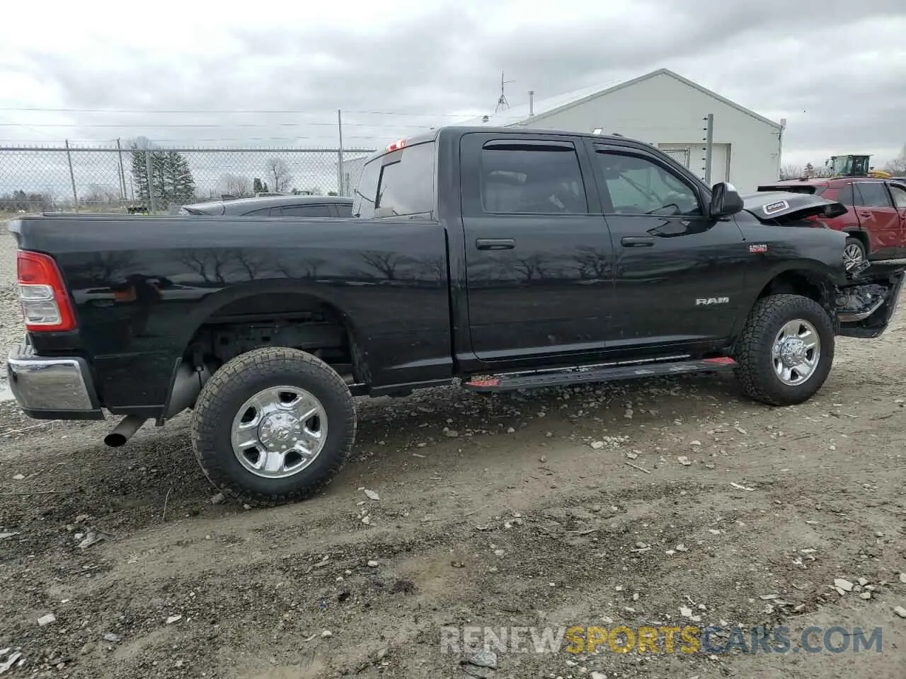 3 Photograph of a damaged car 3C6UR5CJ4NG251655 RAM 2500 2022