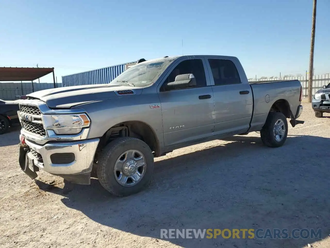 1 Photograph of a damaged car 3C6UR5CJ4NG325723 RAM 2500 2022
