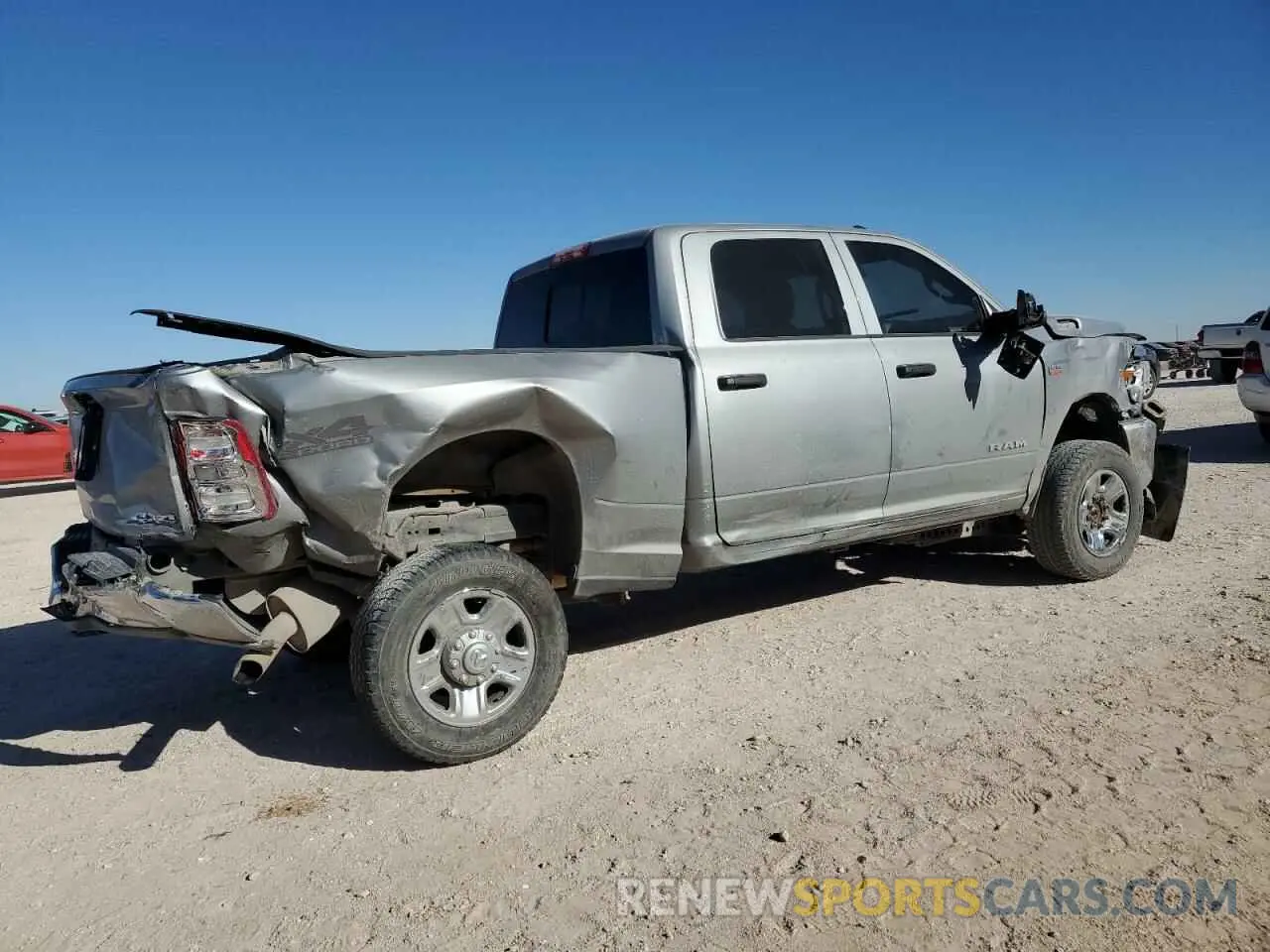 3 Photograph of a damaged car 3C6UR5CJ4NG325723 RAM 2500 2022