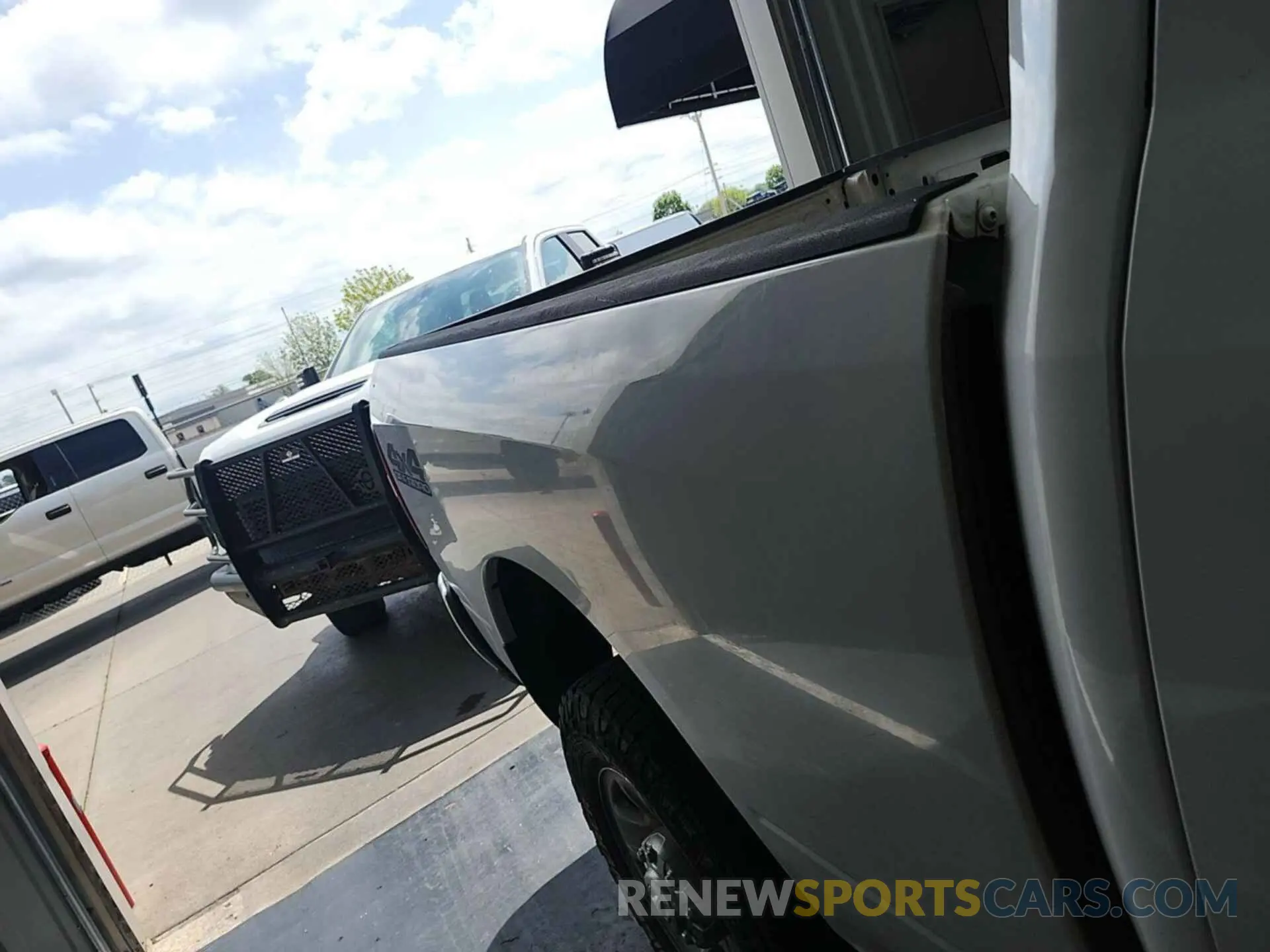 2 Photograph of a damaged car 3C6UR5CJ5NG320854 RAM 2500 2022
