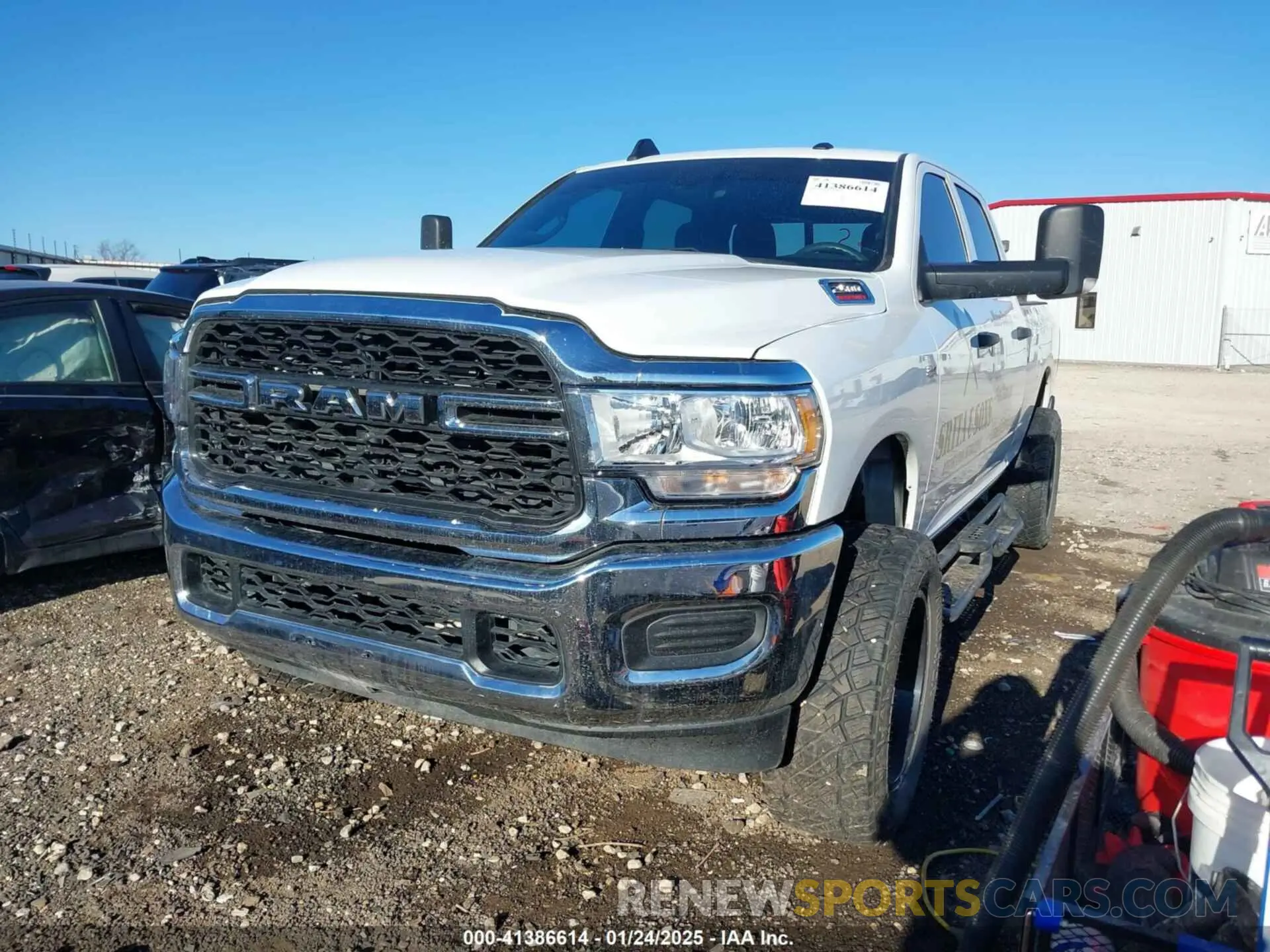 2 Photograph of a damaged car 3C6UR5CJ5NG356107 RAM 2500 2022