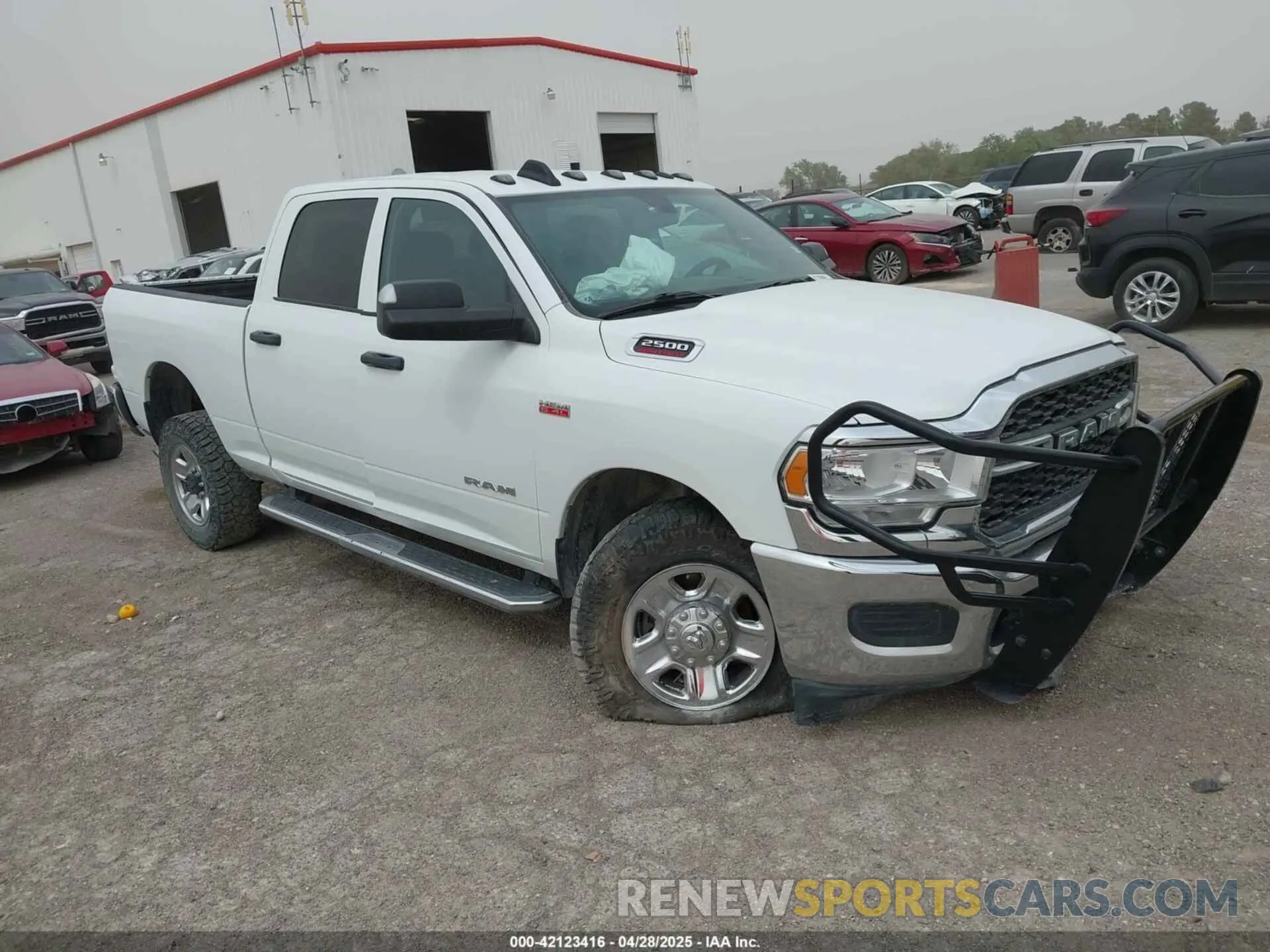 1 Photograph of a damaged car 3C6UR5CJ5NG366524 RAM 2500 2022