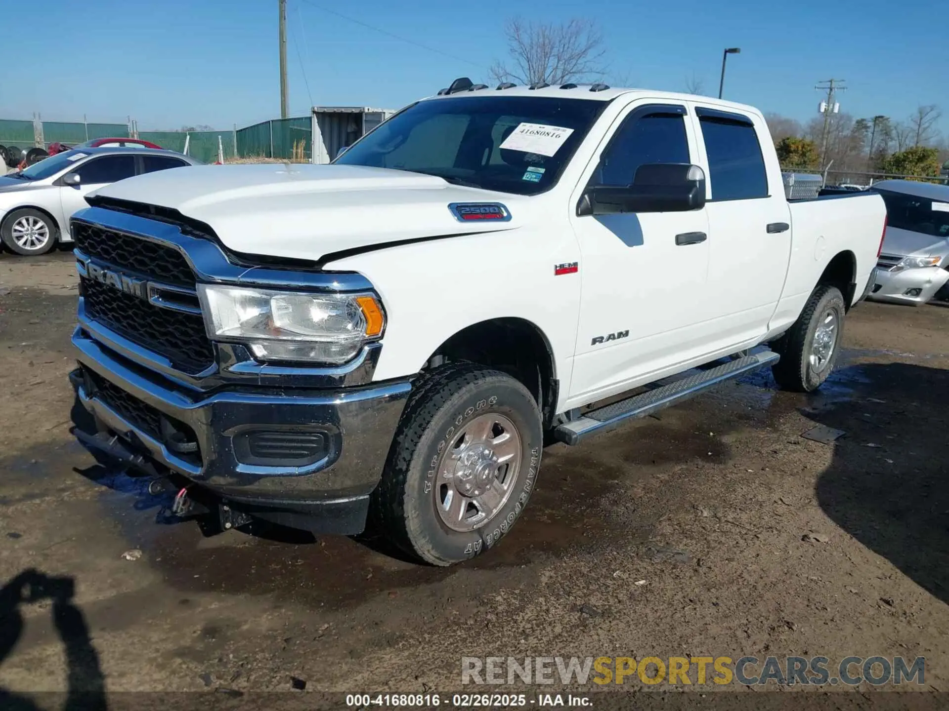 2 Photograph of a damaged car 3C6UR5CJ5NG367849 RAM 2500 2022