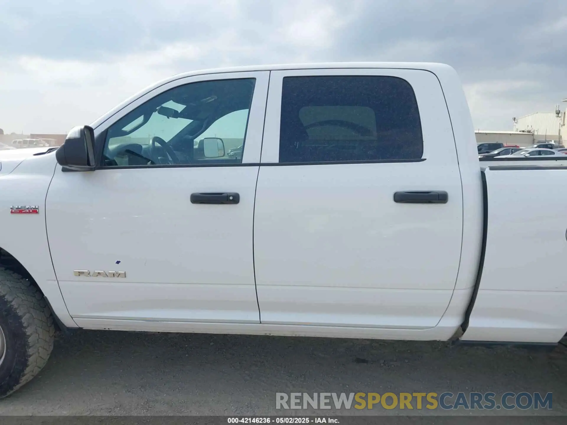 14 Photograph of a damaged car 3C6UR5CJ6NG130982 RAM 2500 2022