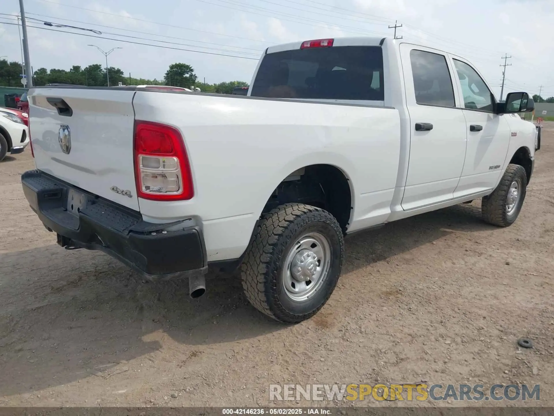 4 Photograph of a damaged car 3C6UR5CJ6NG130982 RAM 2500 2022