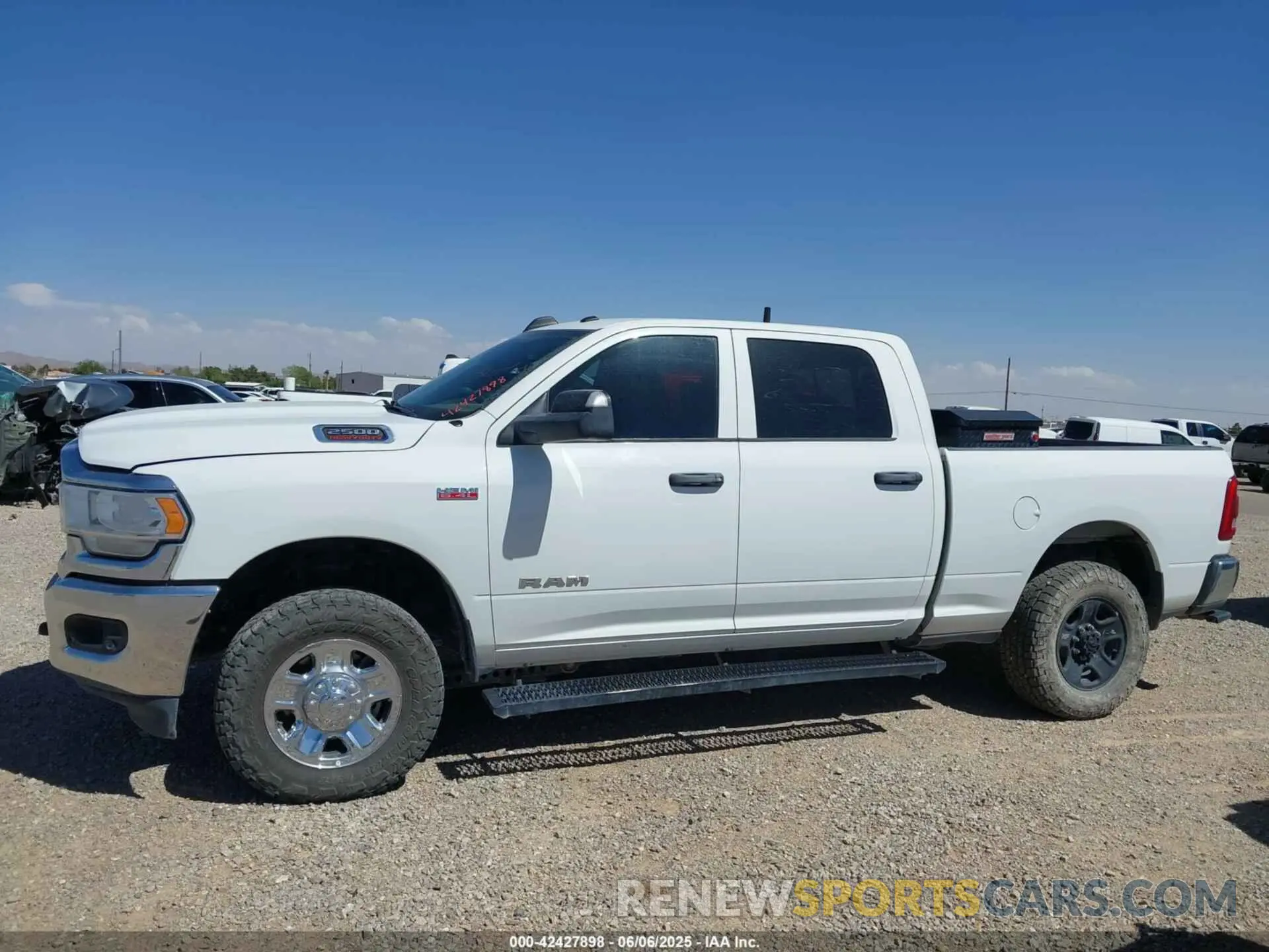14 Photograph of a damaged car 3C6UR5CJ6NG321995 RAM 2500 2022