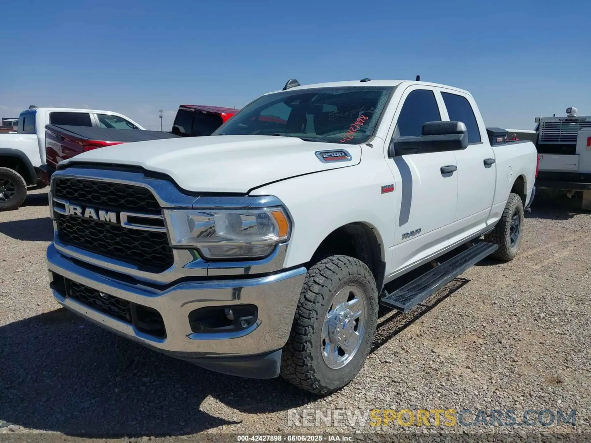 2 Photograph of a damaged car 3C6UR5CJ6NG321995 RAM 2500 2022