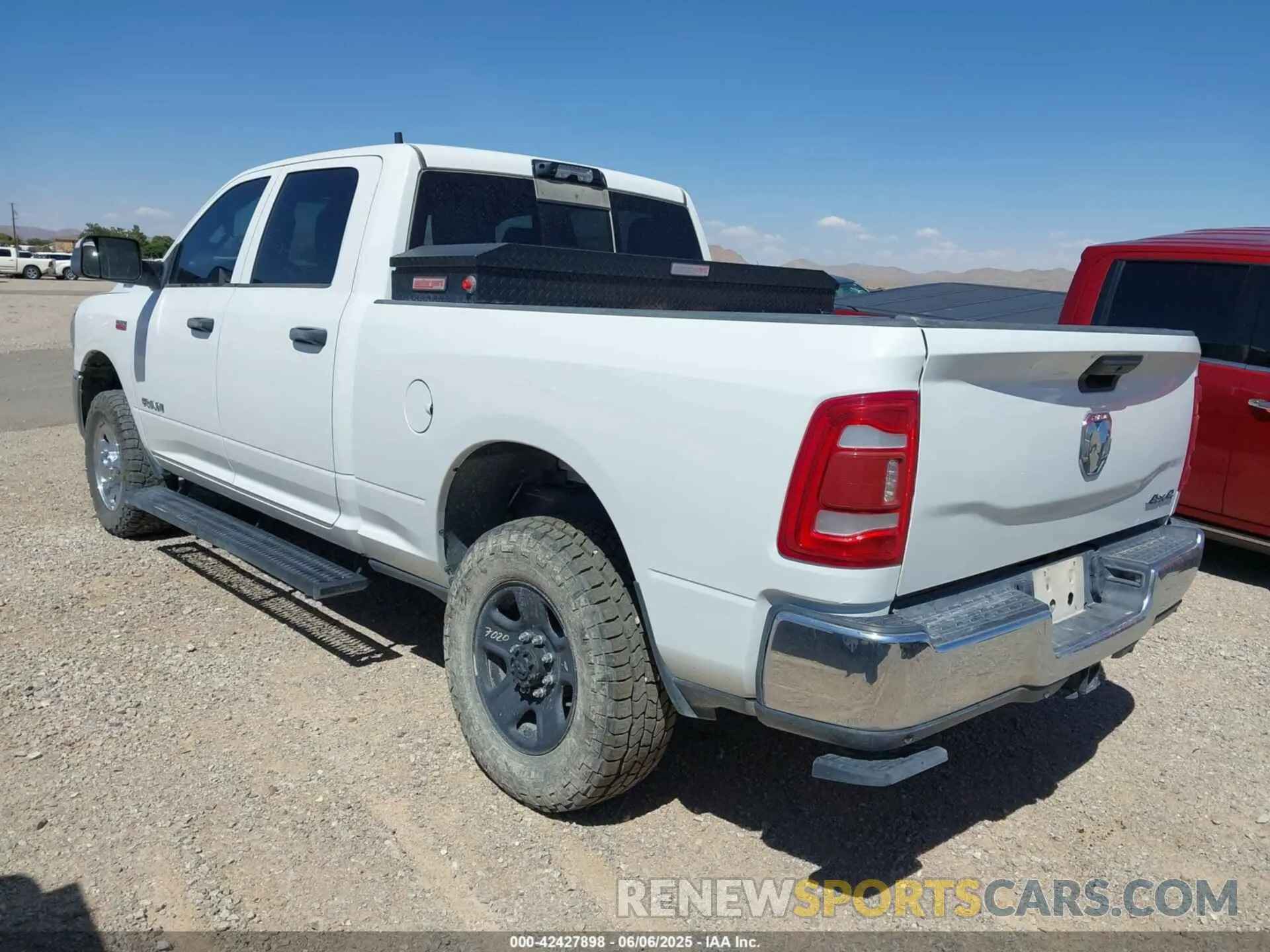 3 Photograph of a damaged car 3C6UR5CJ6NG321995 RAM 2500 2022