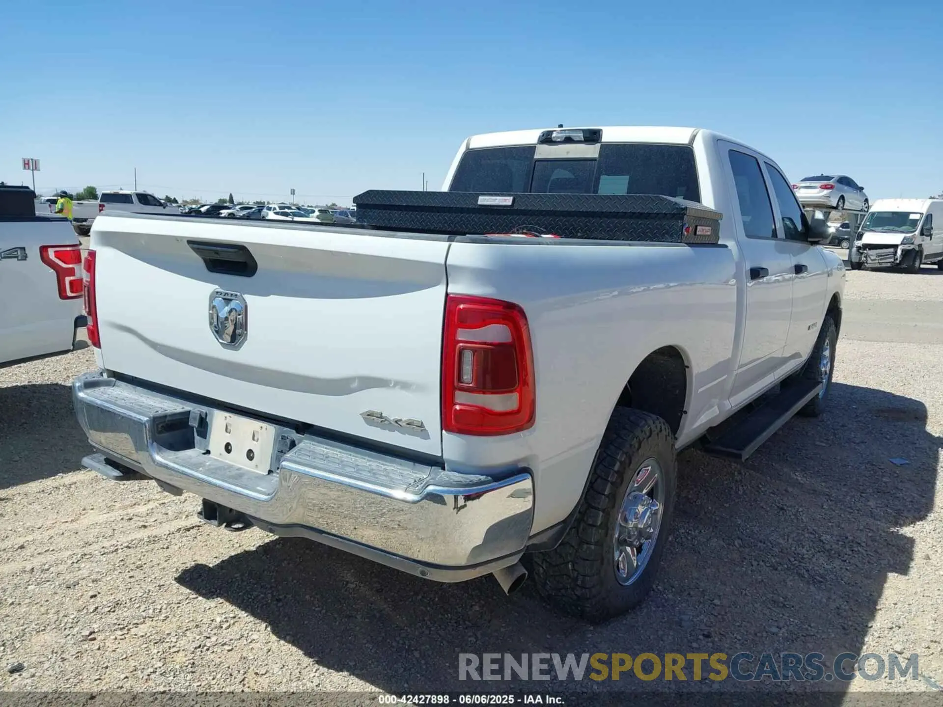 4 Photograph of a damaged car 3C6UR5CJ6NG321995 RAM 2500 2022