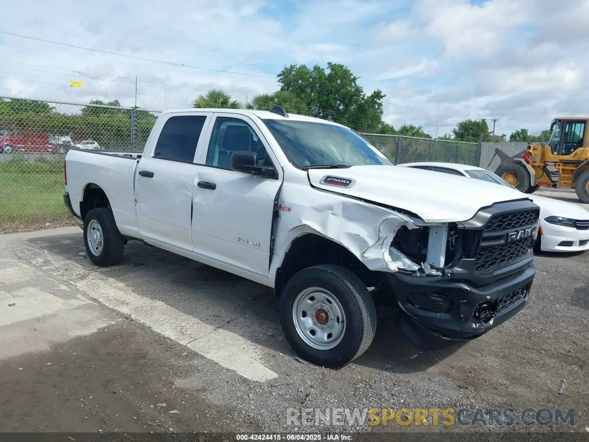 1 Photograph of a damaged car 3C6UR5CJ9NG202399 RAM 2500 2022