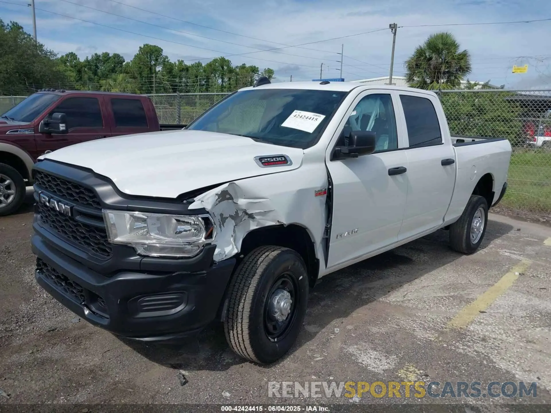 12 Photograph of a damaged car 3C6UR5CJ9NG202399 RAM 2500 2022