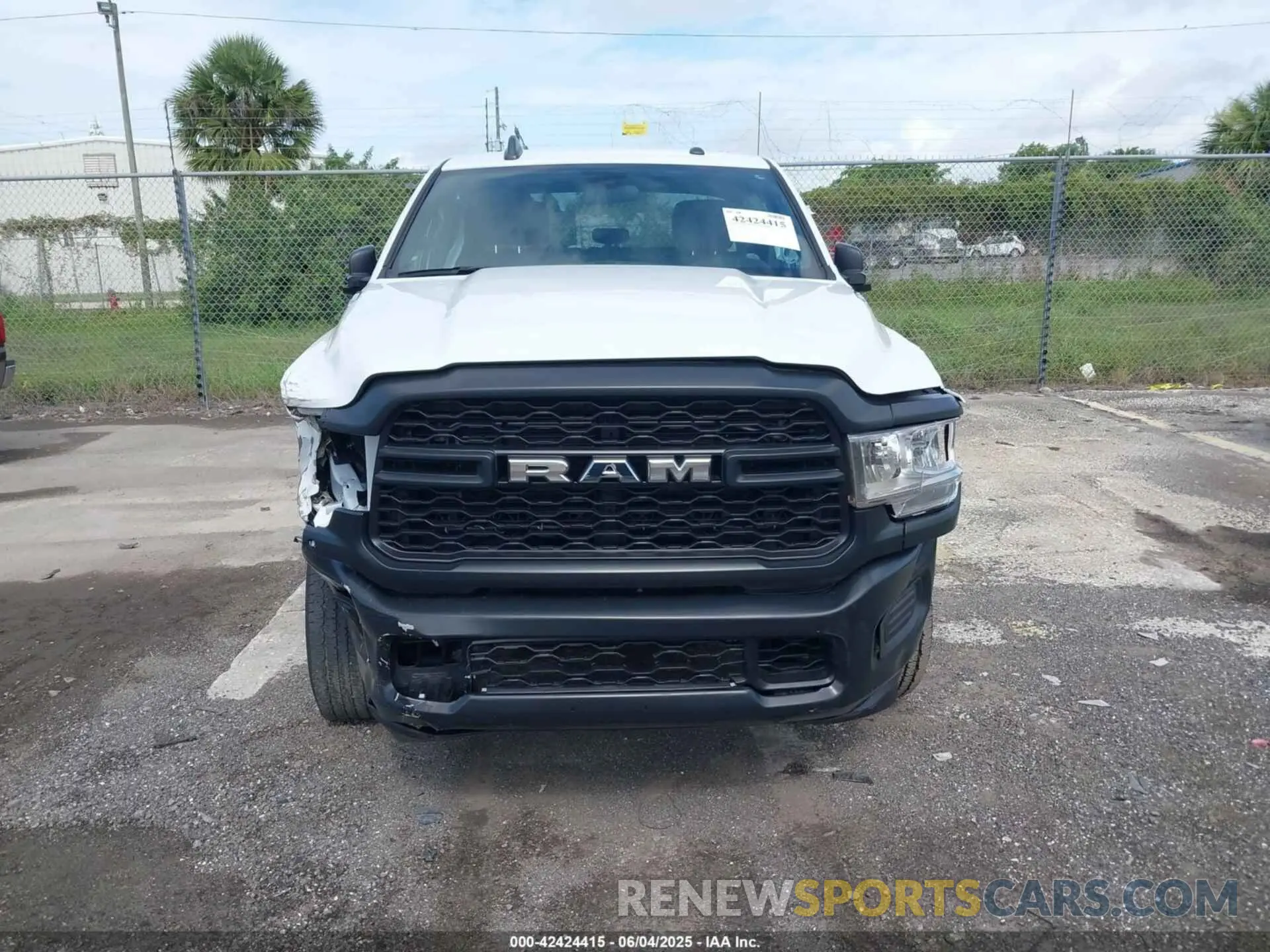 13 Photograph of a damaged car 3C6UR5CJ9NG202399 RAM 2500 2022