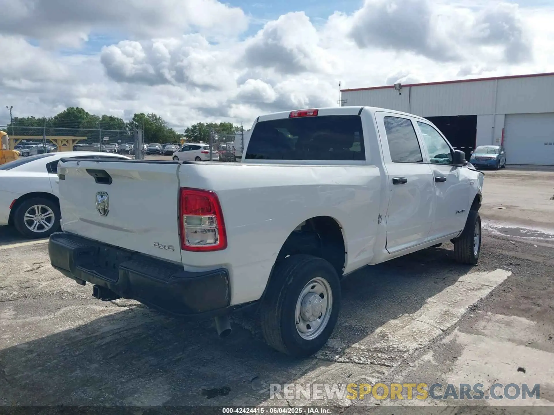 4 Photograph of a damaged car 3C6UR5CJ9NG202399 RAM 2500 2022