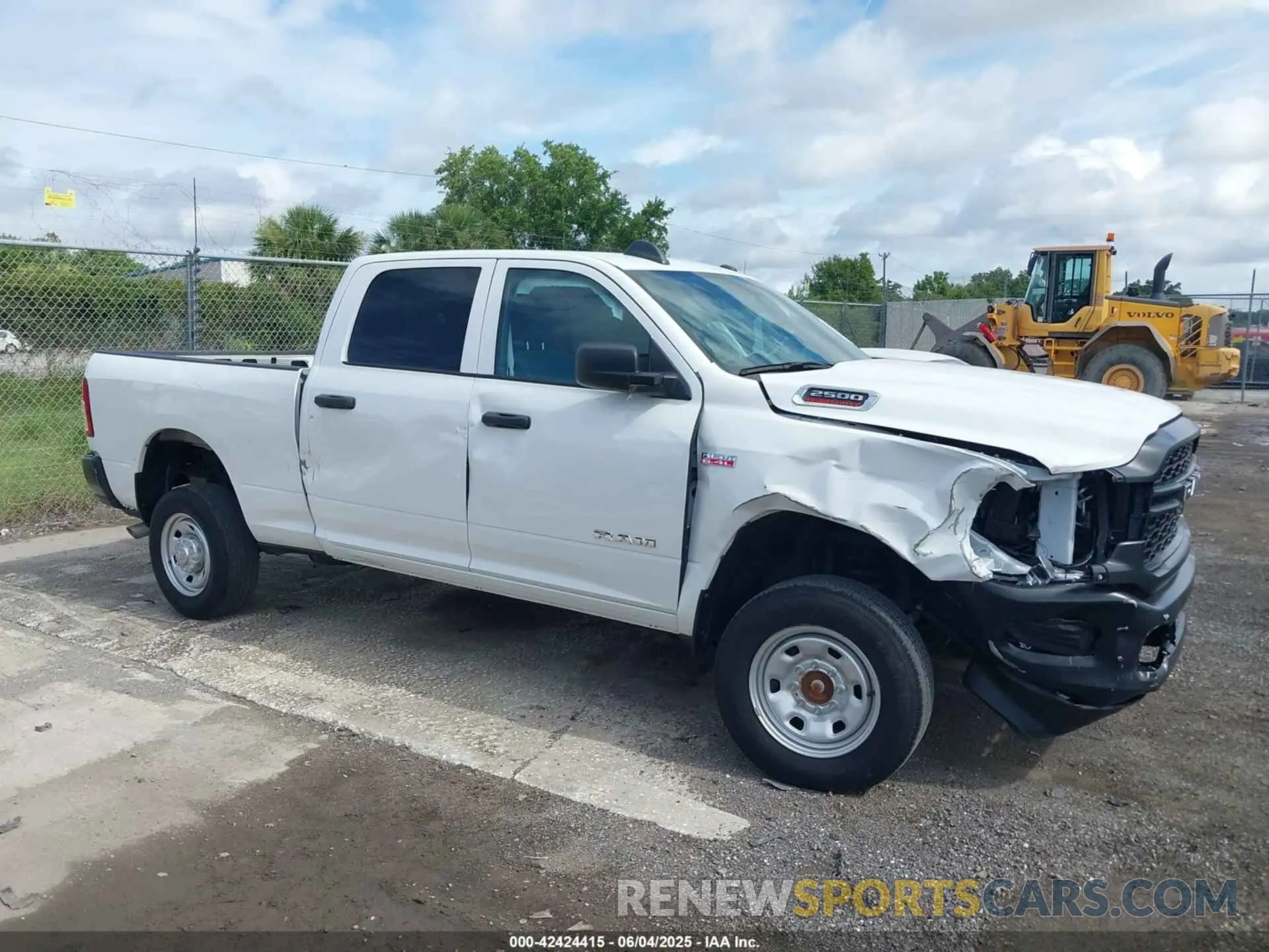 6 Photograph of a damaged car 3C6UR5CJ9NG202399 RAM 2500 2022