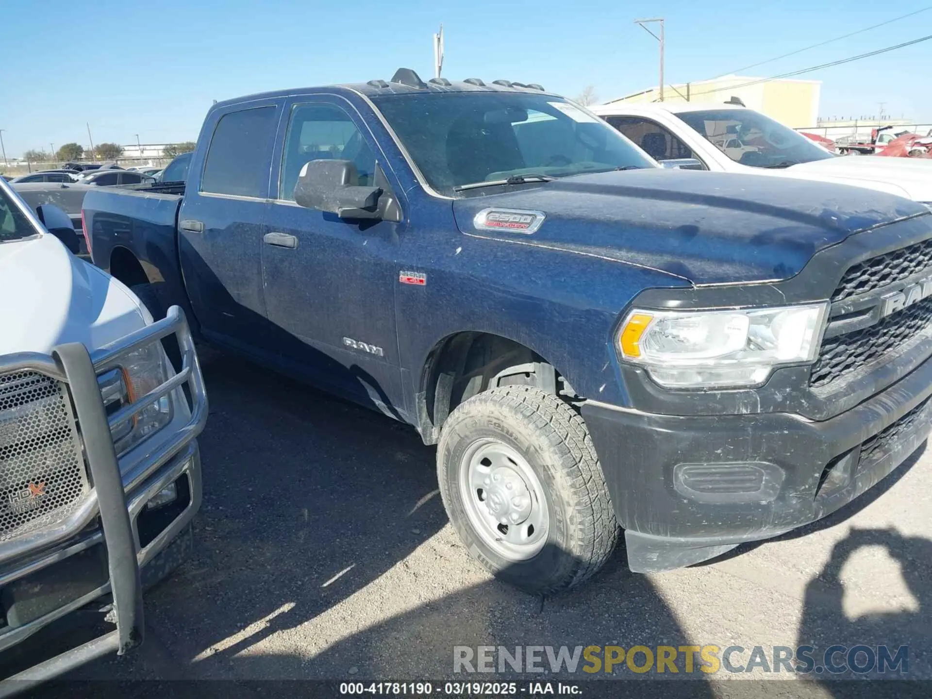1 Photograph of a damaged car 3C6UR5CJ9NG370754 RAM 2500 2022