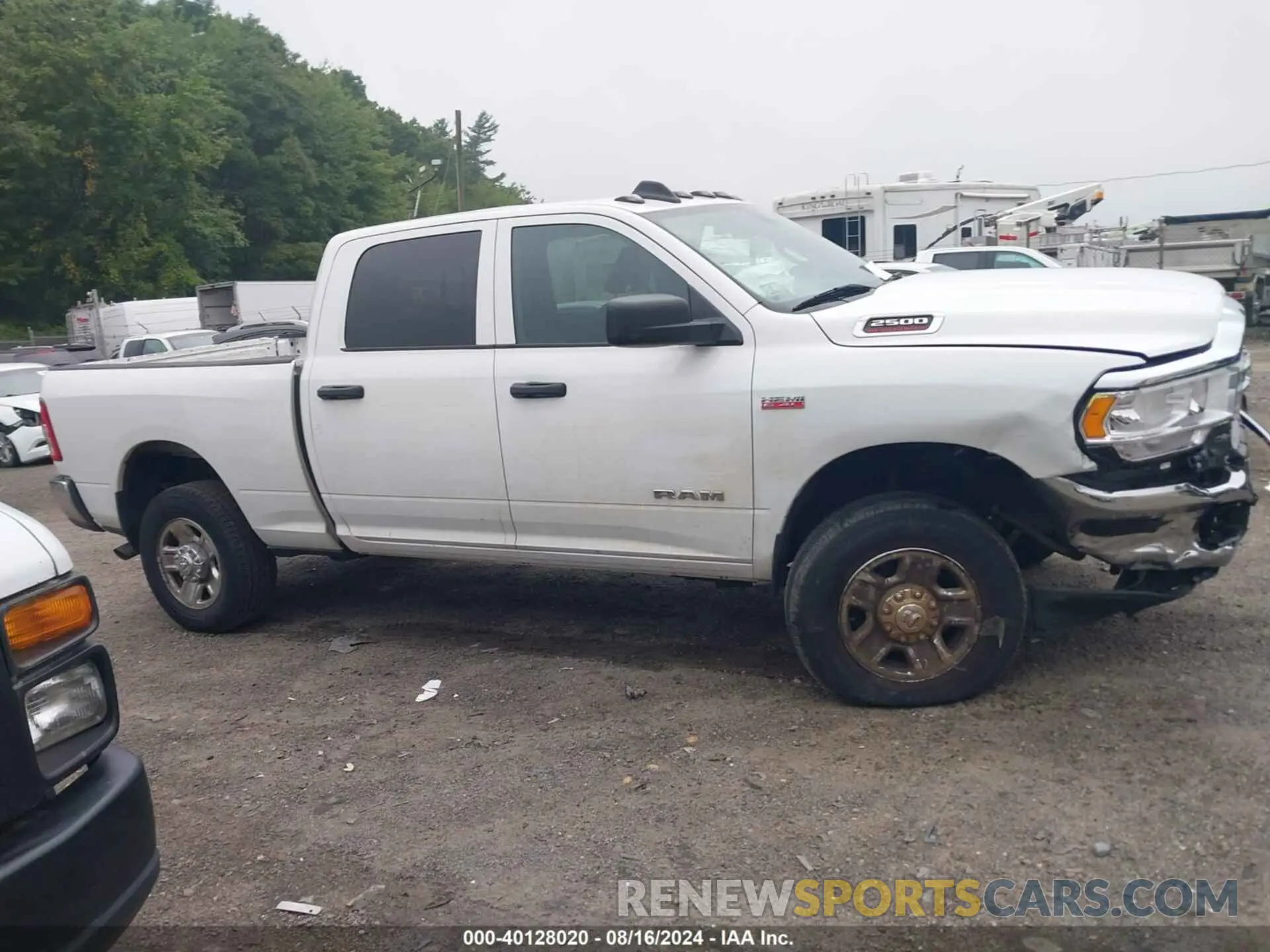 13 Photograph of a damaged car 3C6UR5CJXNG110864 RAM 2500 2022