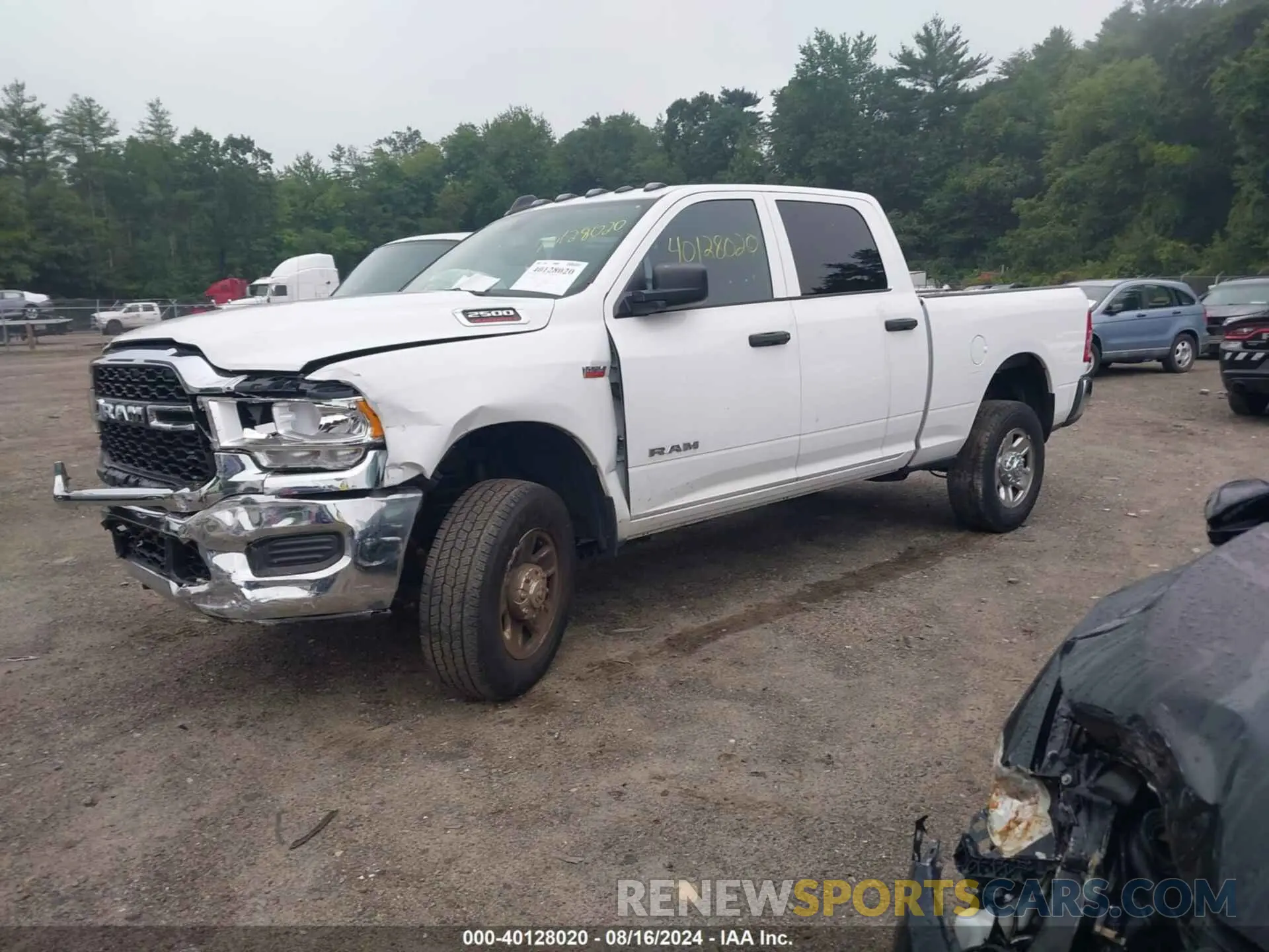 2 Photograph of a damaged car 3C6UR5CJXNG110864 RAM 2500 2022