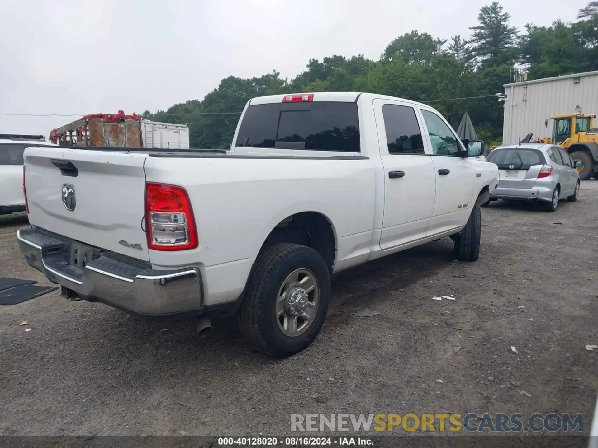 4 Photograph of a damaged car 3C6UR5CJXNG110864 RAM 2500 2022