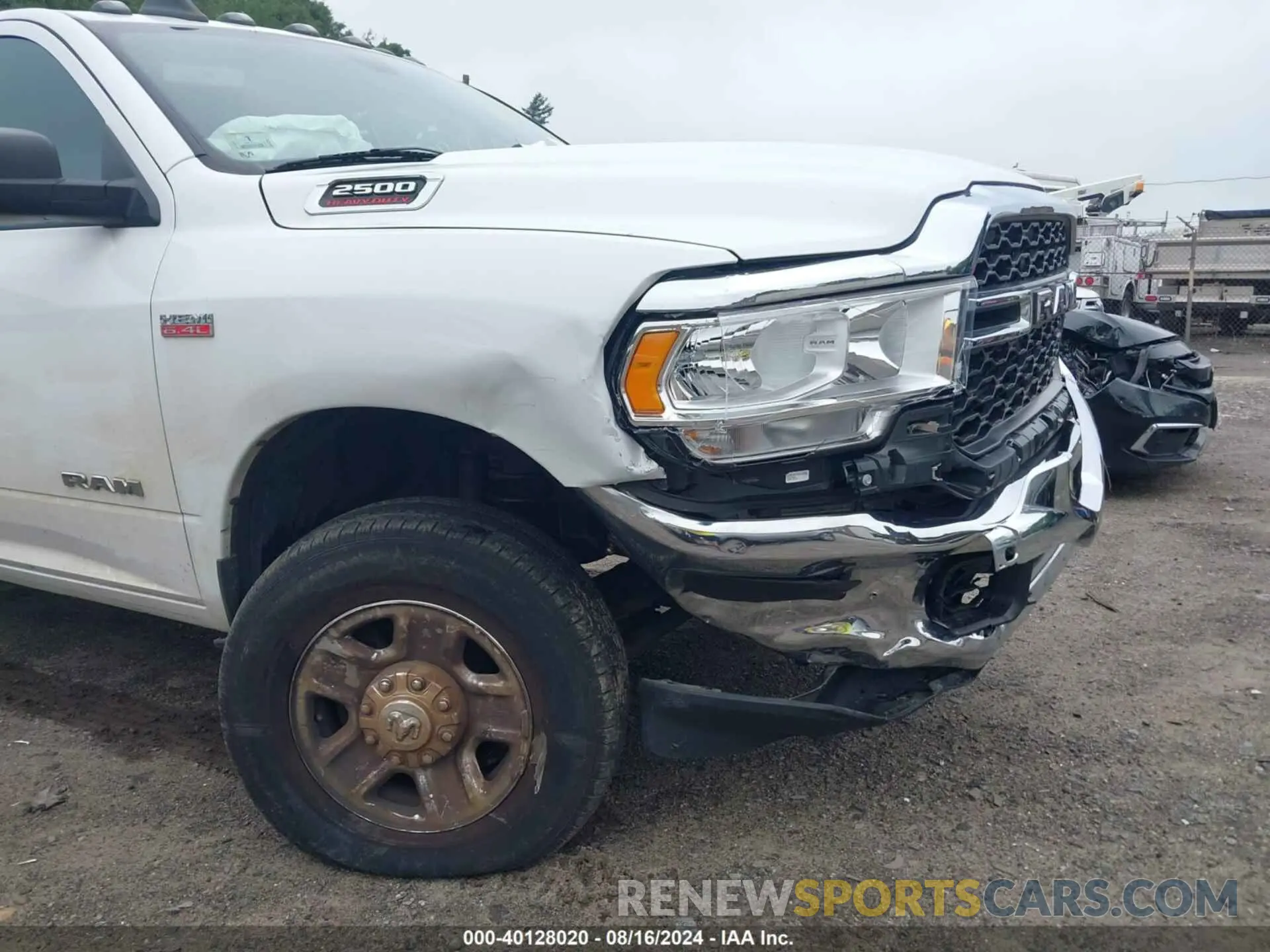 6 Photograph of a damaged car 3C6UR5CJXNG110864 RAM 2500 2022