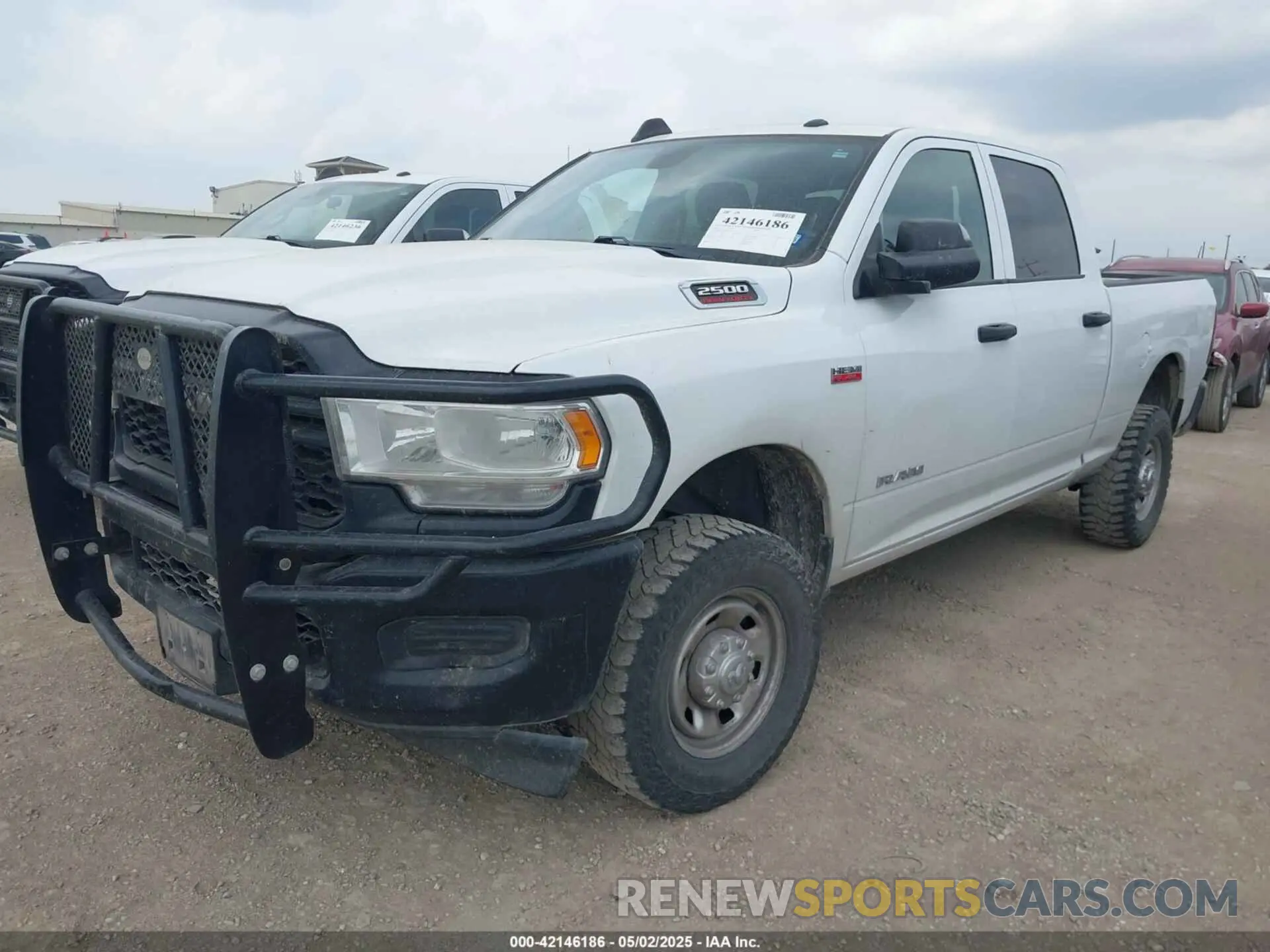 2 Photograph of a damaged car 3C6UR5CJXNG204016 RAM 2500 2022