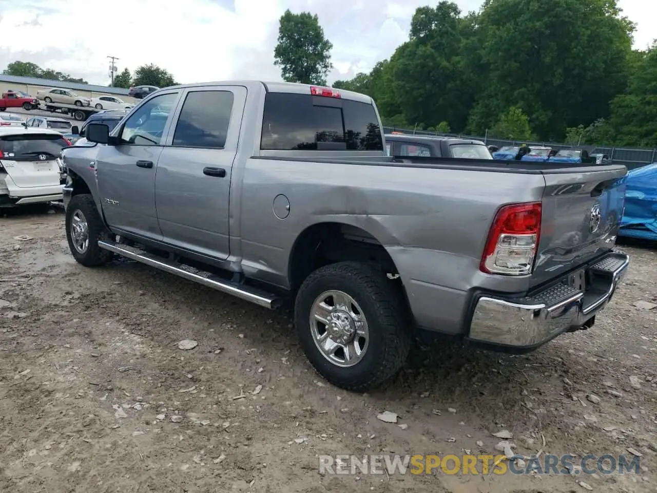 2 Photograph of a damaged car 3C6UR5CL1NG223040 RAM 2500 2022