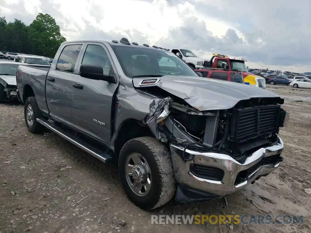 4 Photograph of a damaged car 3C6UR5CL1NG223040 RAM 2500 2022