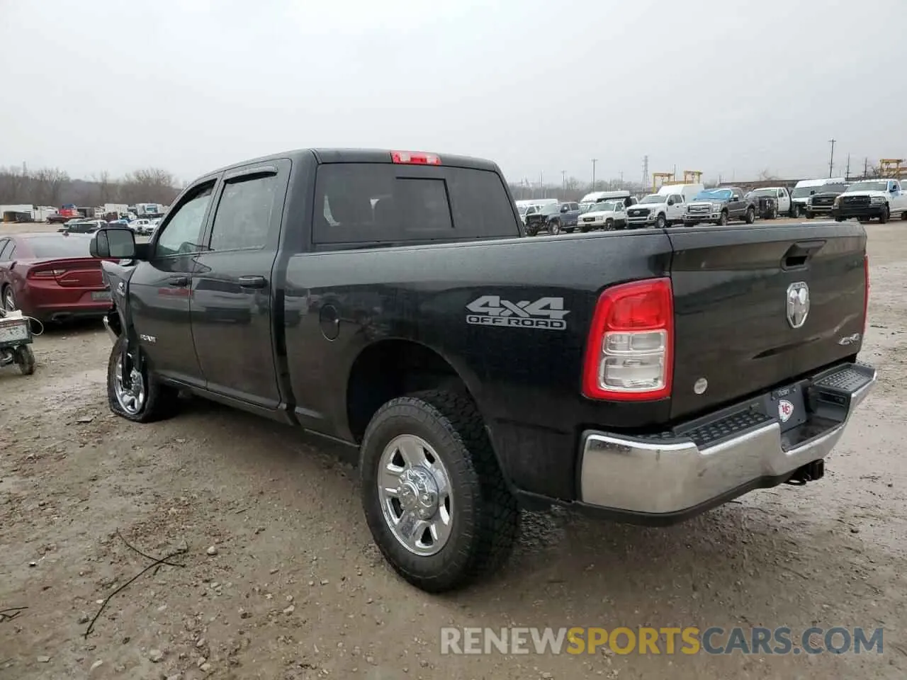 2 Photograph of a damaged car 3C6UR5CL1NG252490 RAM 2500 2022