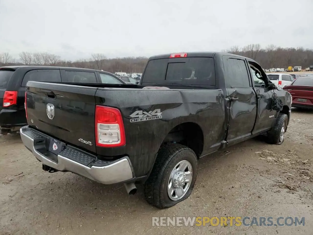 3 Photograph of a damaged car 3C6UR5CL1NG252490 RAM 2500 2022
