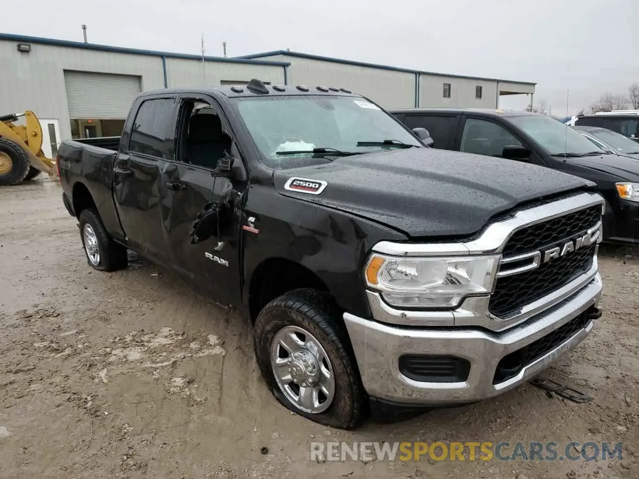 4 Photograph of a damaged car 3C6UR5CL1NG252490 RAM 2500 2022