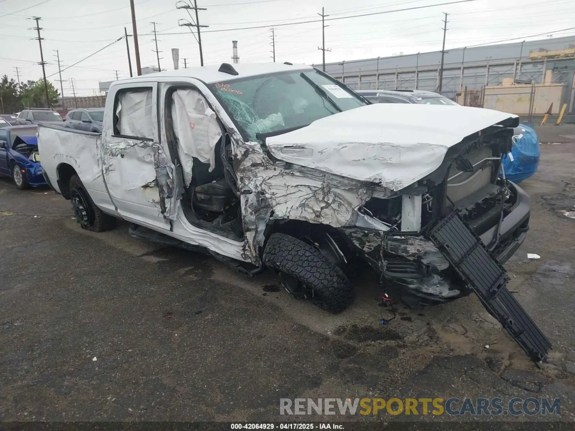 1 Photograph of a damaged car 3C6UR5CL1NG438188 RAM 2500 2022